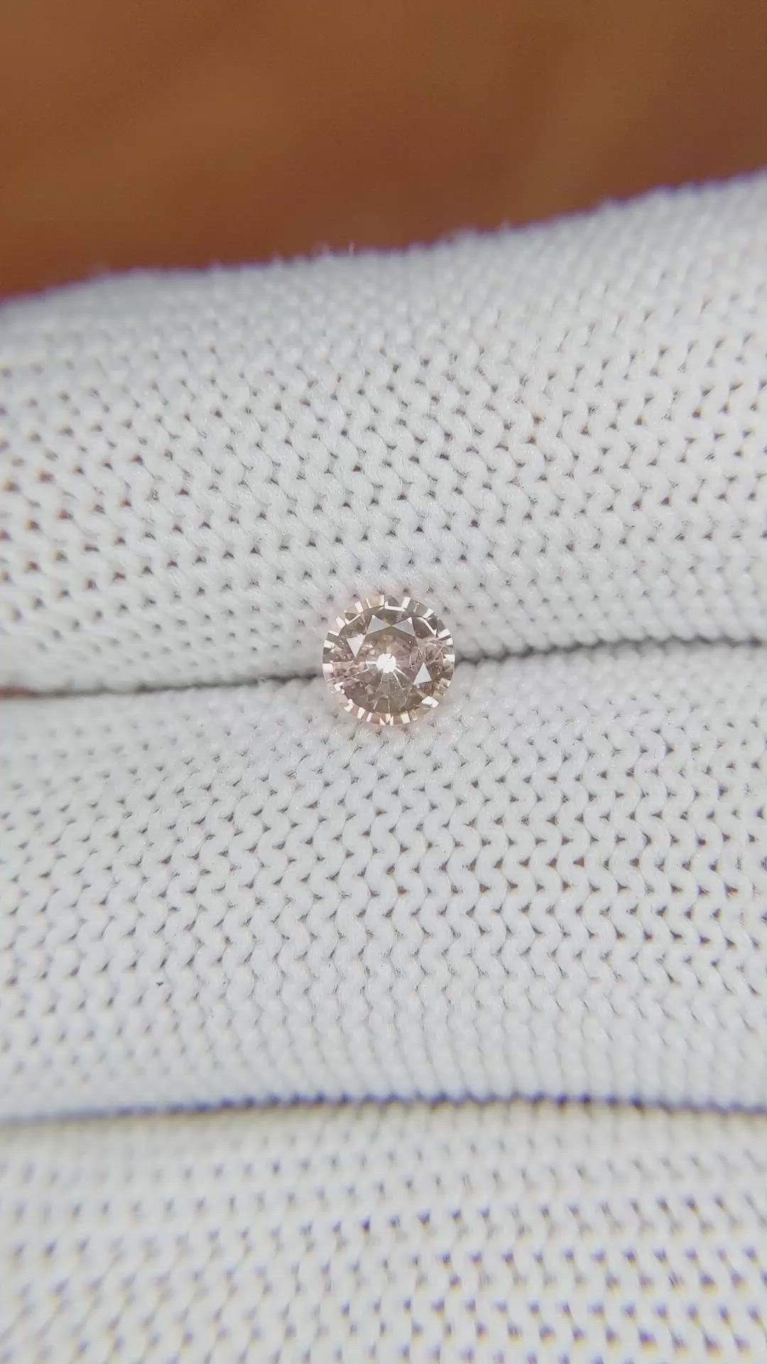 0.56 Ct. Peach Sapphire from Ceylon (Sri Lanka) Size Video