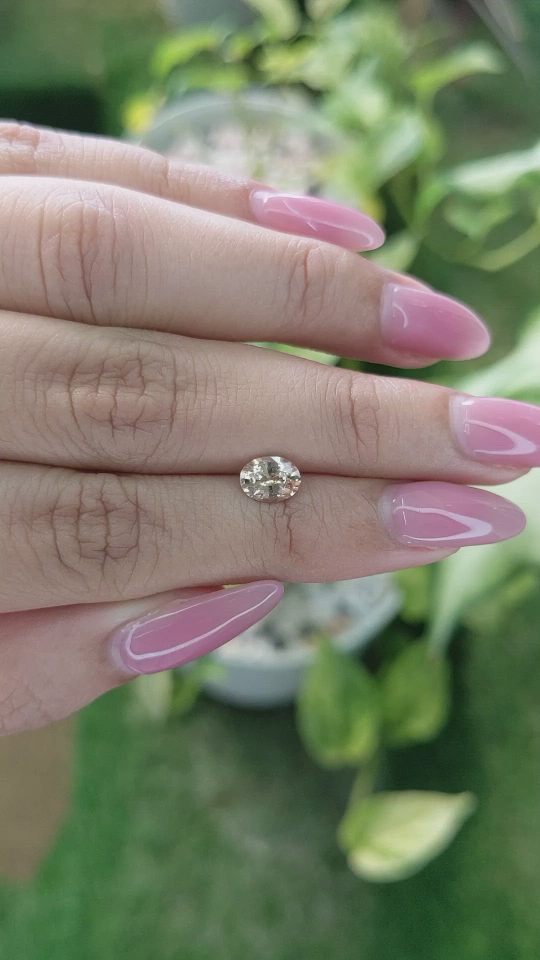 0.96 Ct. Peach Sapphire from Ceylon (Sri Lanka) Size Video