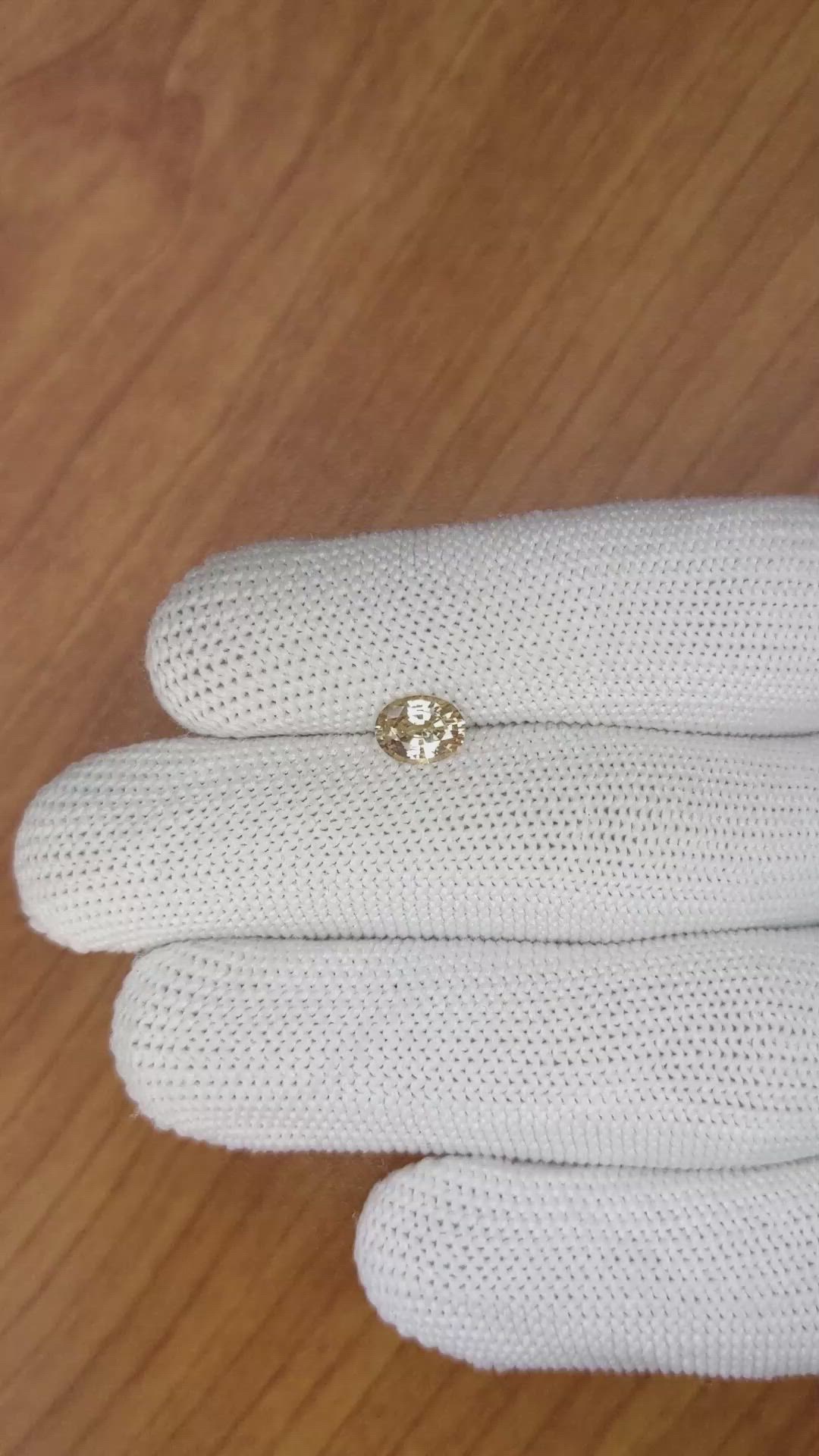 0.96 Ct. Peach Sapphire from Ceylon (Sri Lanka) Size Video