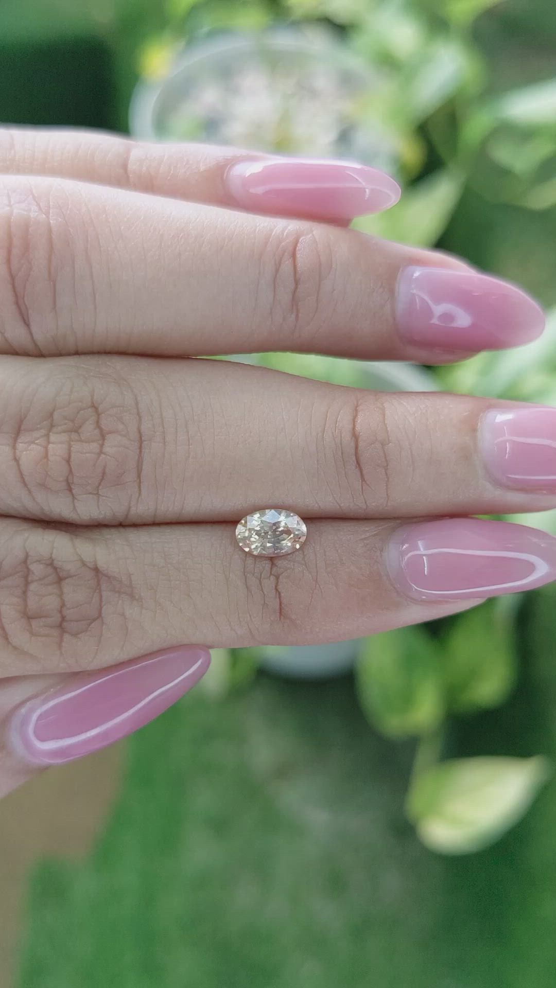 0.77 Ct. Peach Sapphire from Ceylon (Sri Lanka) Size Video