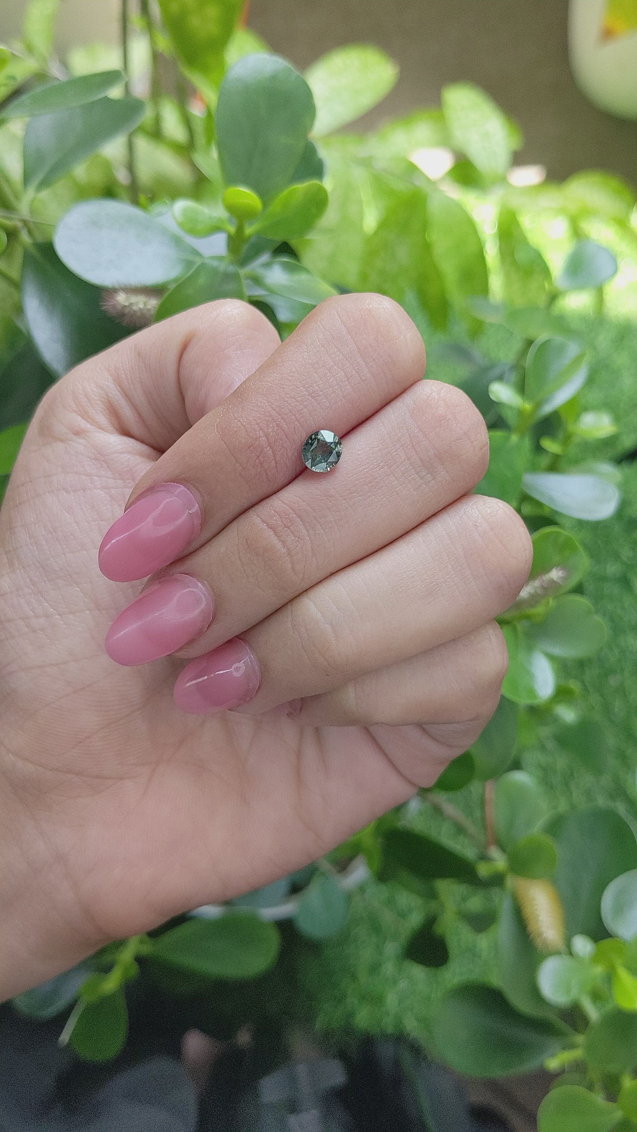 1.02 Ct. Bluish Green Sapphire from Madagascar Size Video