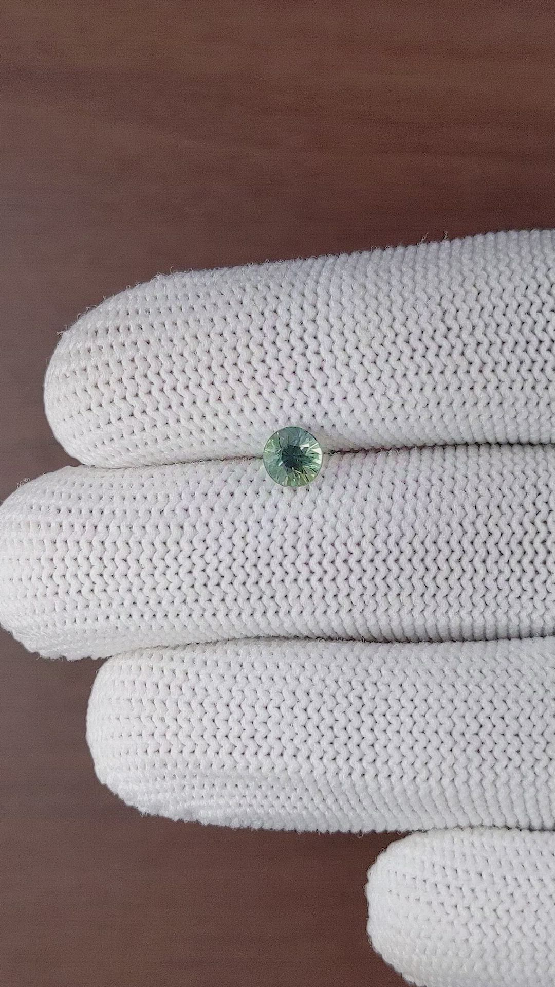 0.86 Ct. Bluish Green Sapphire from Madagascar Size Video