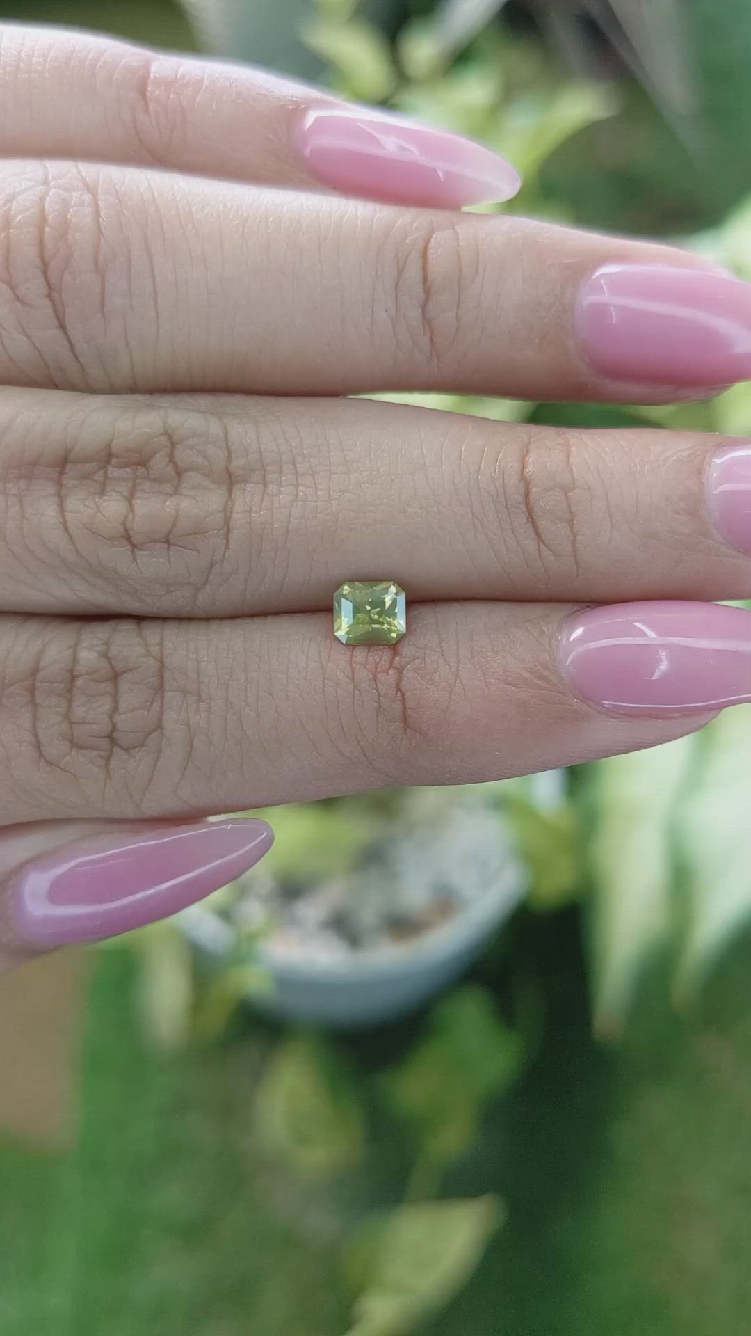 0.60 Ct. Yellowish Green Sapphire from Ceylon (Sri Lanka) Size Video