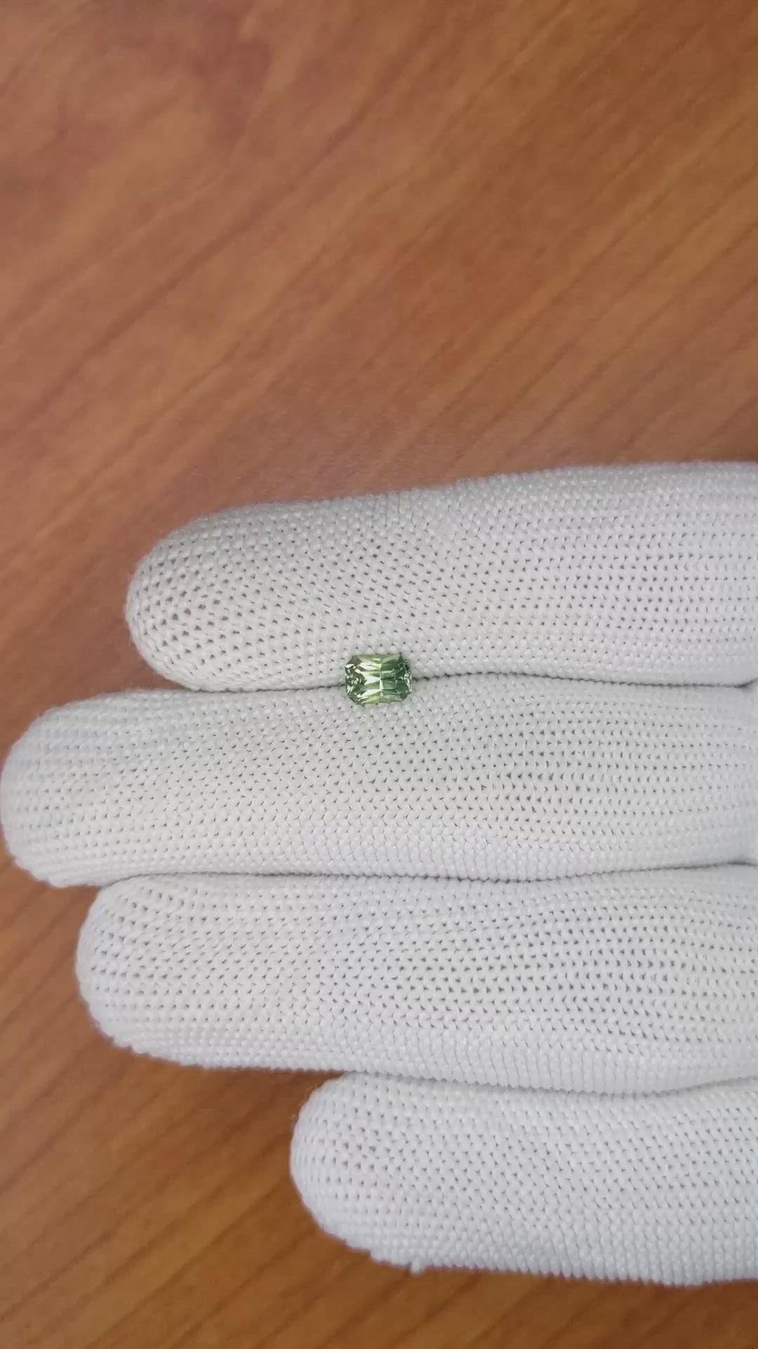0.68 Ct. Yellowish Green Sapphire from Ceylon (Sri Lanka) Size Video