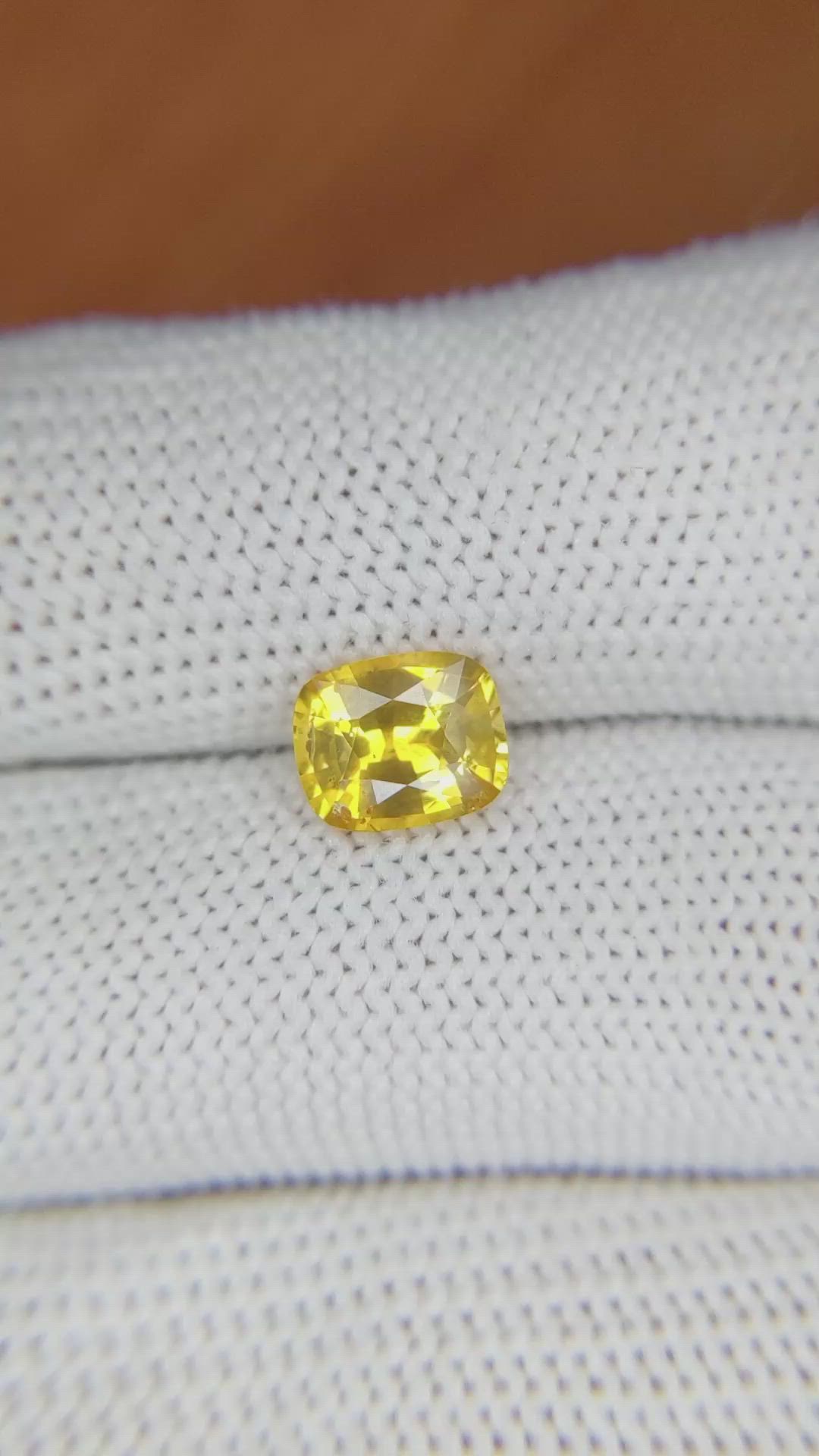 1.74 Ct. Orangish Yellow Sapphire from Ceylon (Sri Lanka) Size Video
