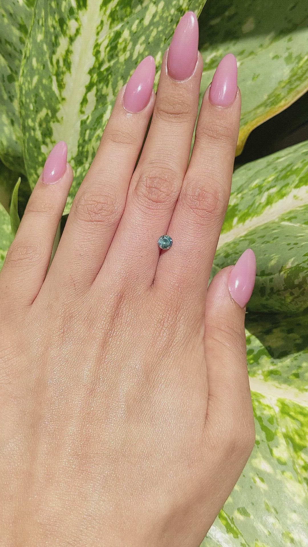 0.59 Ct. Bluish Green Sapphire from Madagascar Size Video