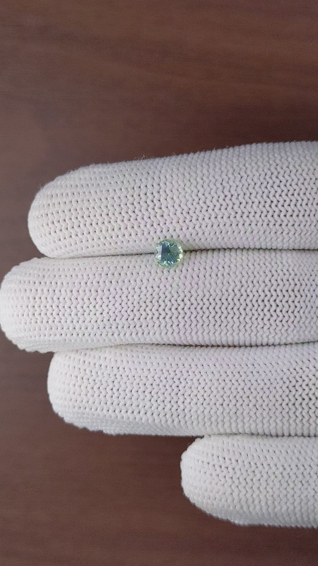 0.59 Ct. Bluish Green Sapphire from Madagascar Size Video