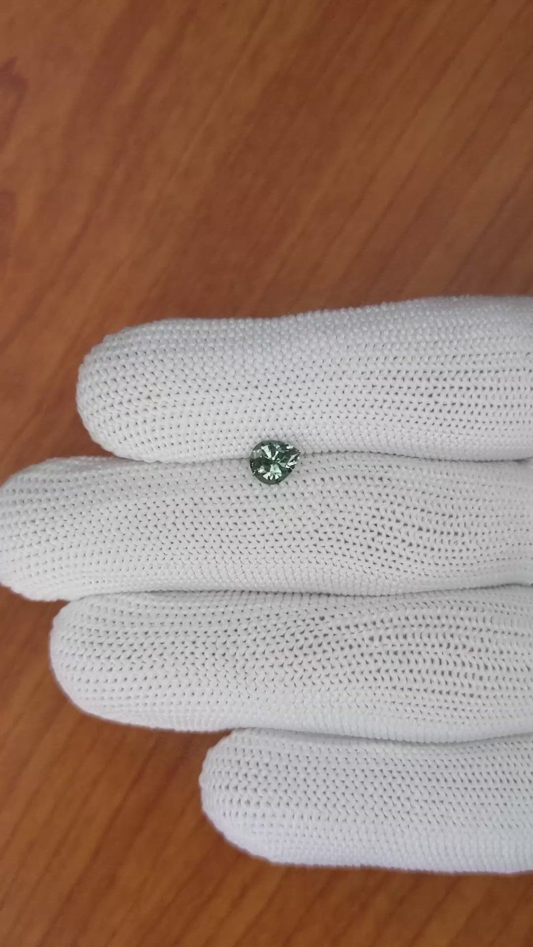 0.71 Ct. Green Sapphire from Ceylon (Sri Lanka) Size Video