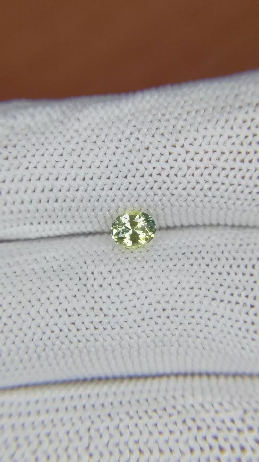 0.52 Ct. Yellowish Green Sapphire from Ceylon (Sri Lanka) Size Video