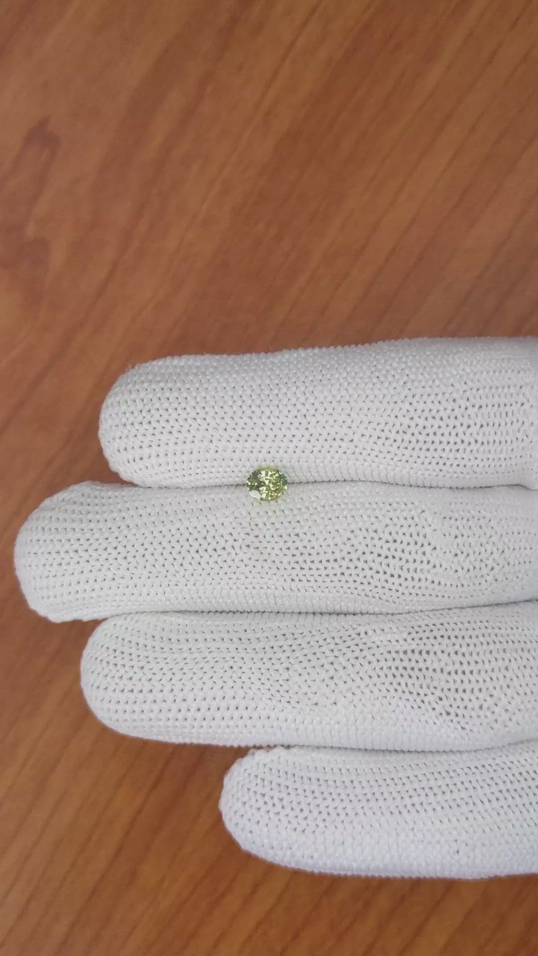0.52 Ct. Yellowish Green Sapphire from Ceylon (Sri Lanka) Size Video