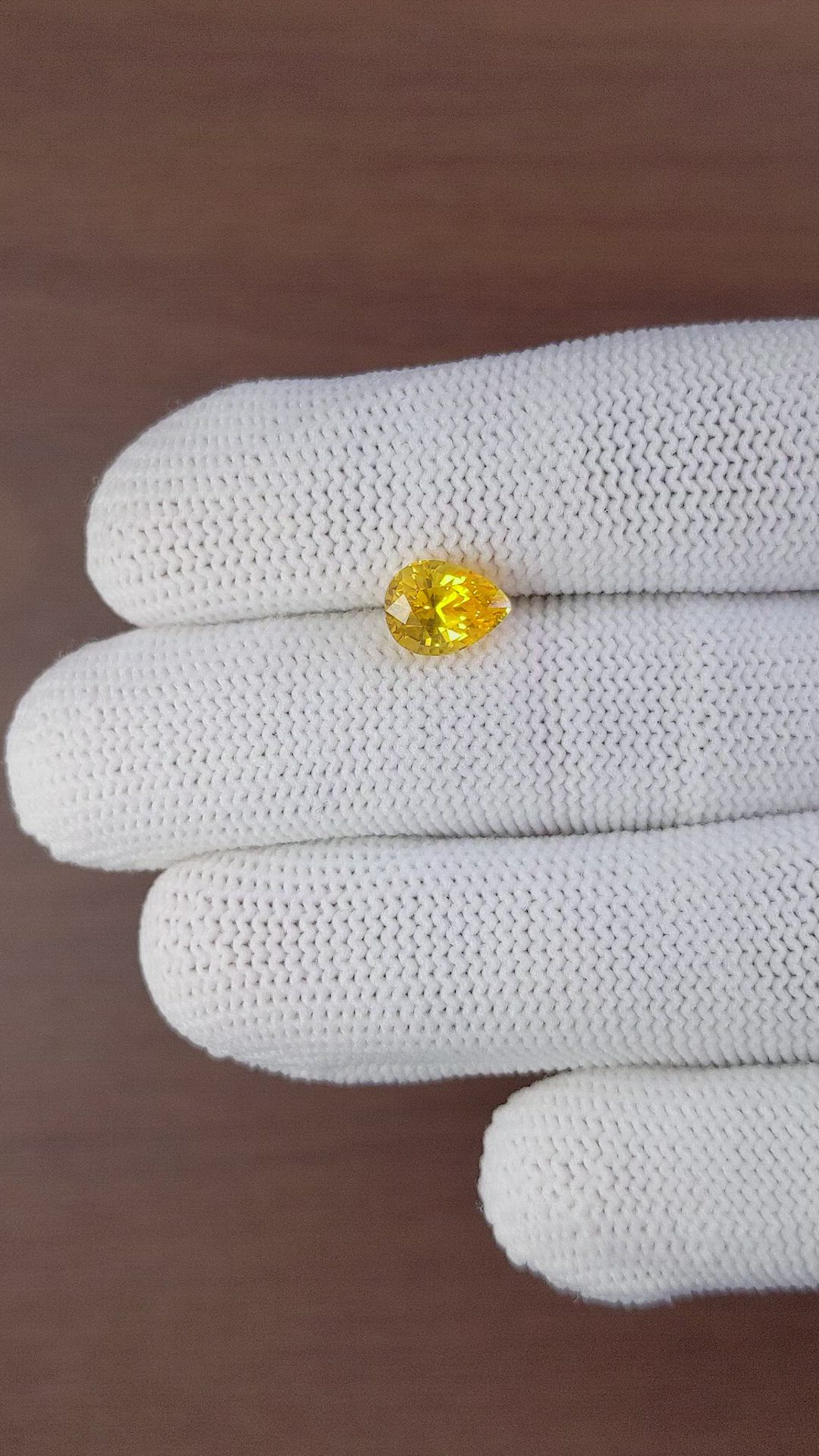 2.52 Ct. Orangish Yellow Sapphire from Ceylon (Sri Lanka) Size Video
