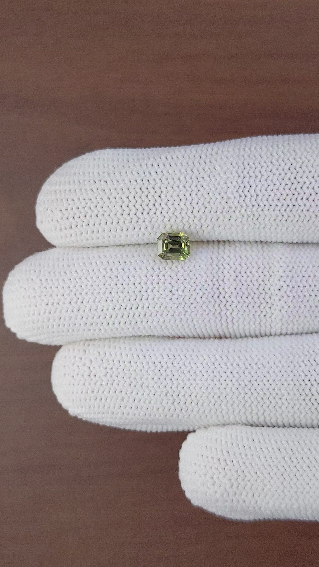 1.31 Ct. Greenish Brown Sapphire from Madagascar Size Video