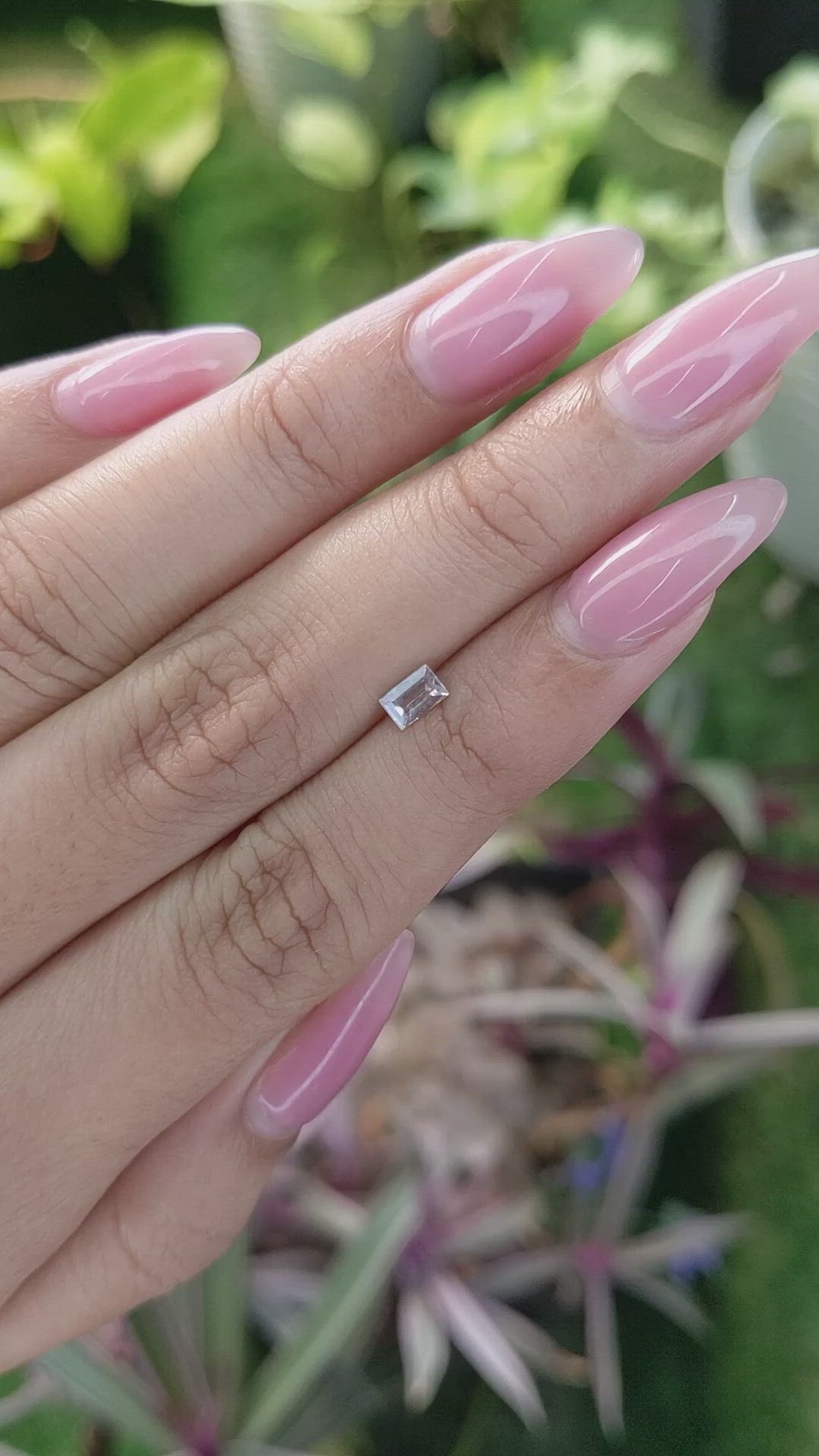 0.39 Ct. Peach Sapphire from Ceylon (Sri Lanka) Size Video