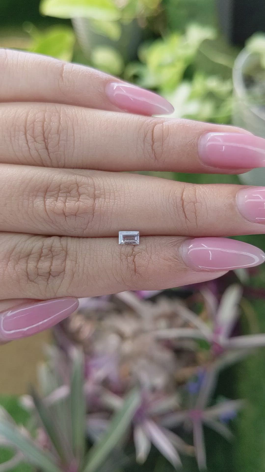0.39 Ct. Peach Sapphire from Ceylon (Sri Lanka) Size Video