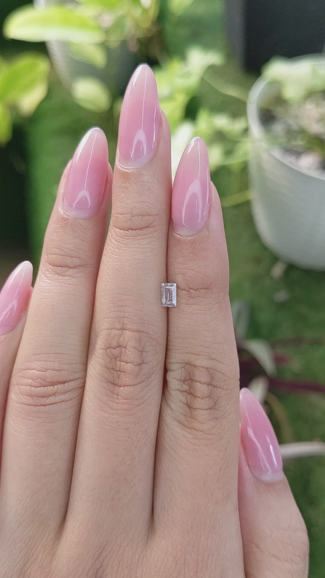 0.39 Ct. Peach Sapphire from Ceylon (Sri Lanka) Size Video