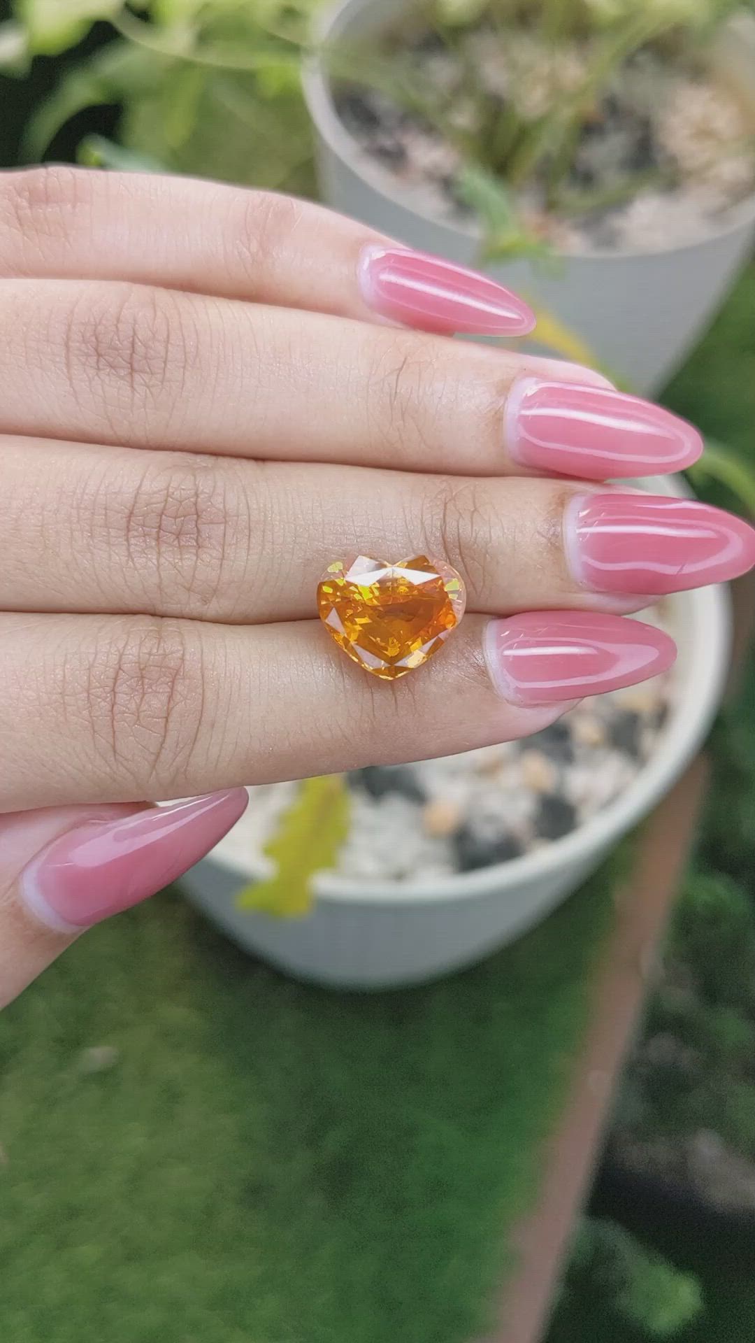 8.47 Ct. Orange Sapphire from Ceylon (Sri Lanka) Size Video