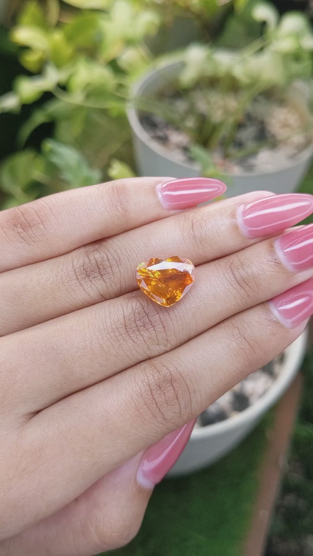 8.47 Ct. Orange Sapphire from Ceylon (Sri Lanka) Size Video