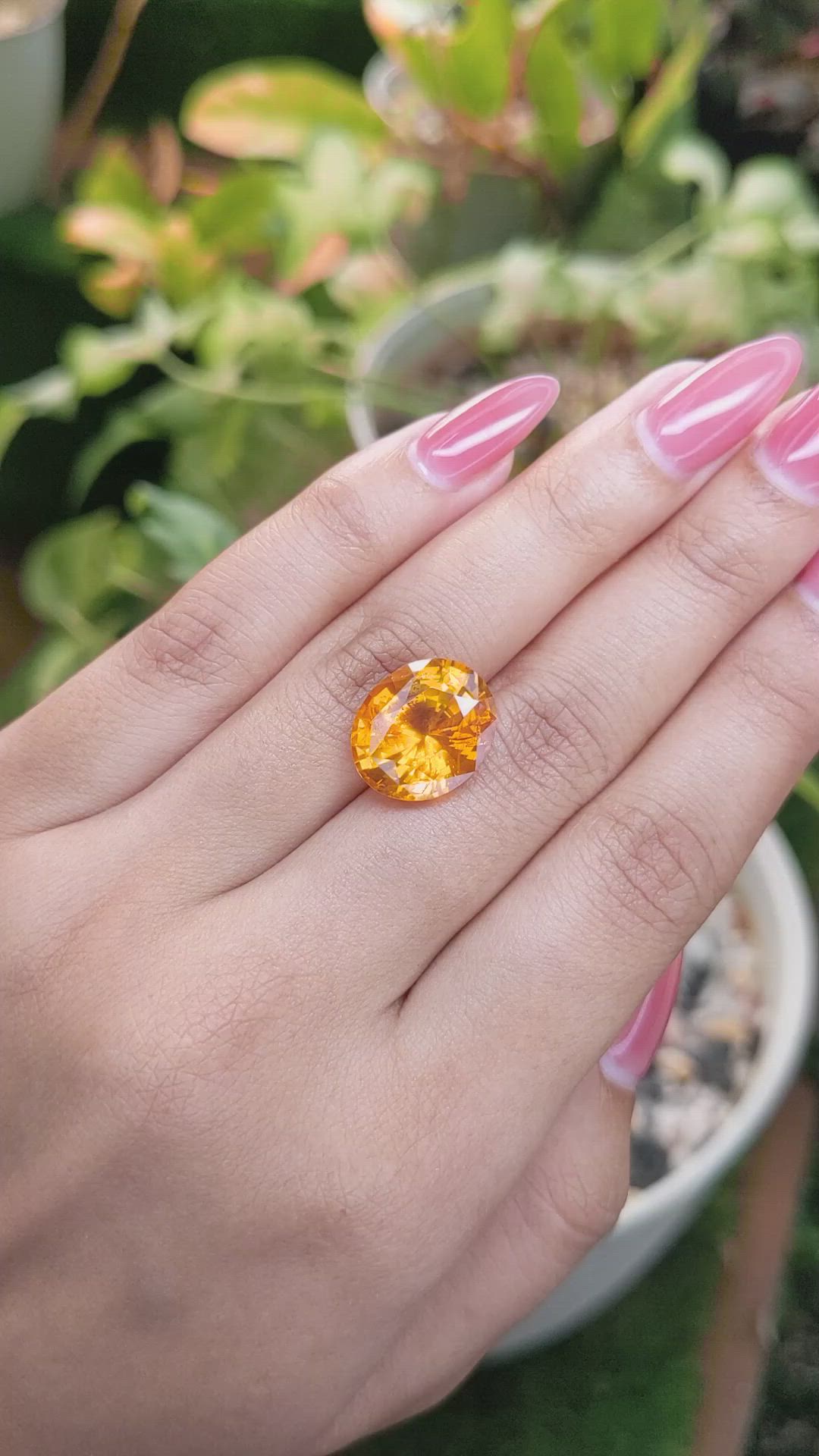 12.05 Ct. Orange Sapphire from Ceylon (Sri Lanka) Size Video