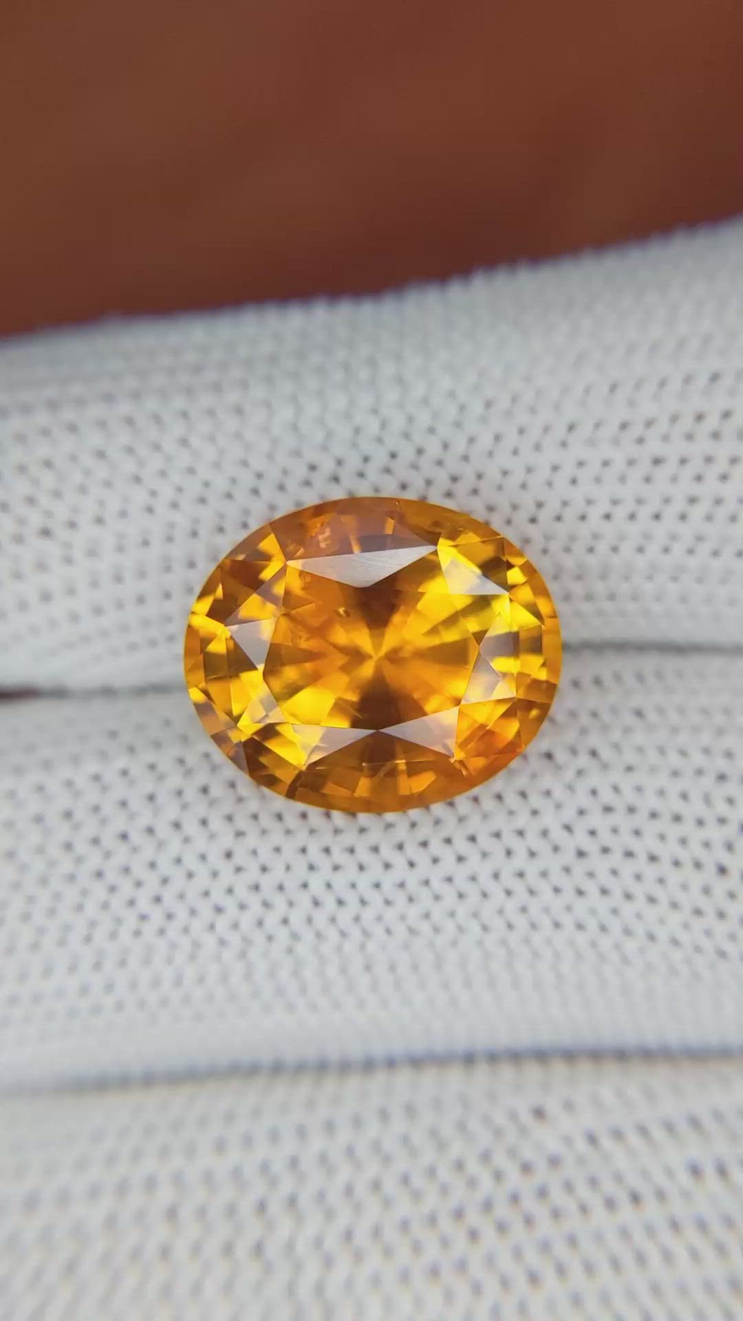 12.05 Ct. Orange Sapphire from Ceylon (Sri Lanka) Size Video