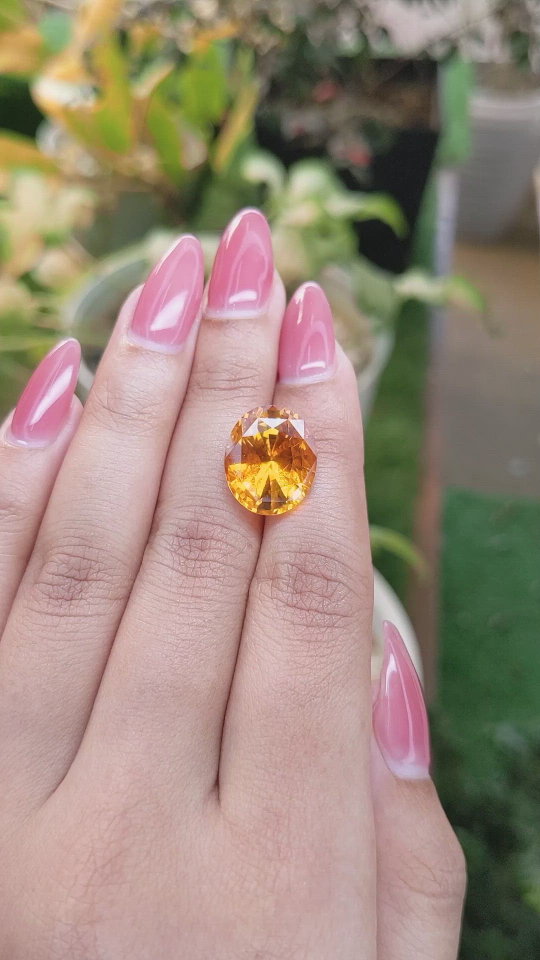12.05 Ct. Orange Sapphire from Ceylon (Sri Lanka) Size Video