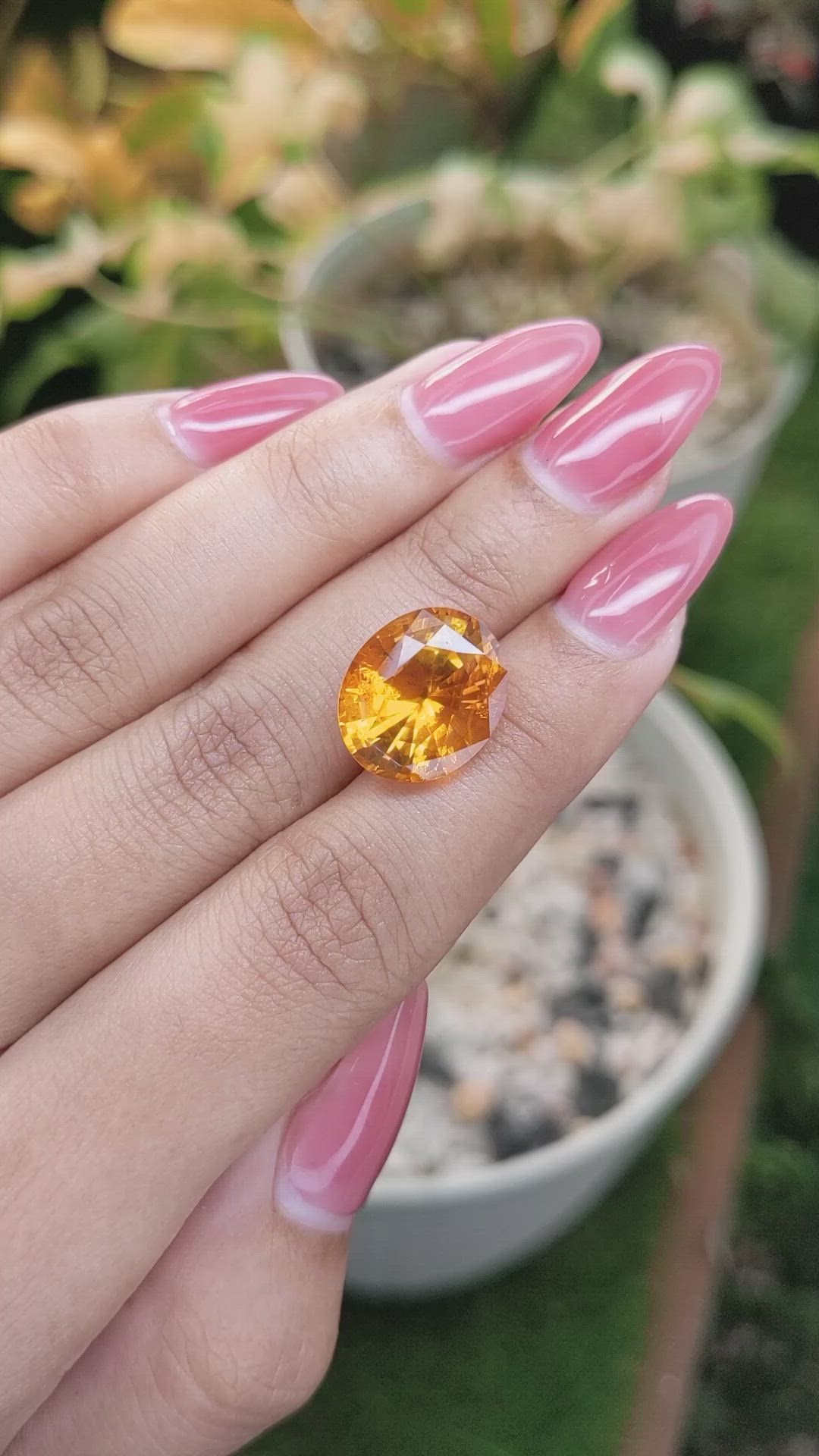 12.05 Ct. Orange Sapphire from Ceylon (Sri Lanka) Size Video