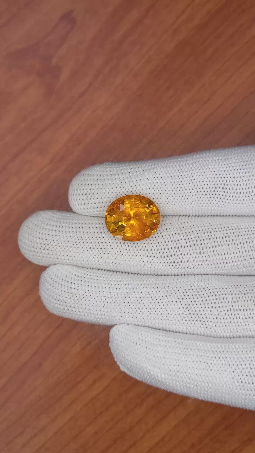 12.05 Ct. Orange Sapphire from Ceylon (Sri Lanka) Size Video