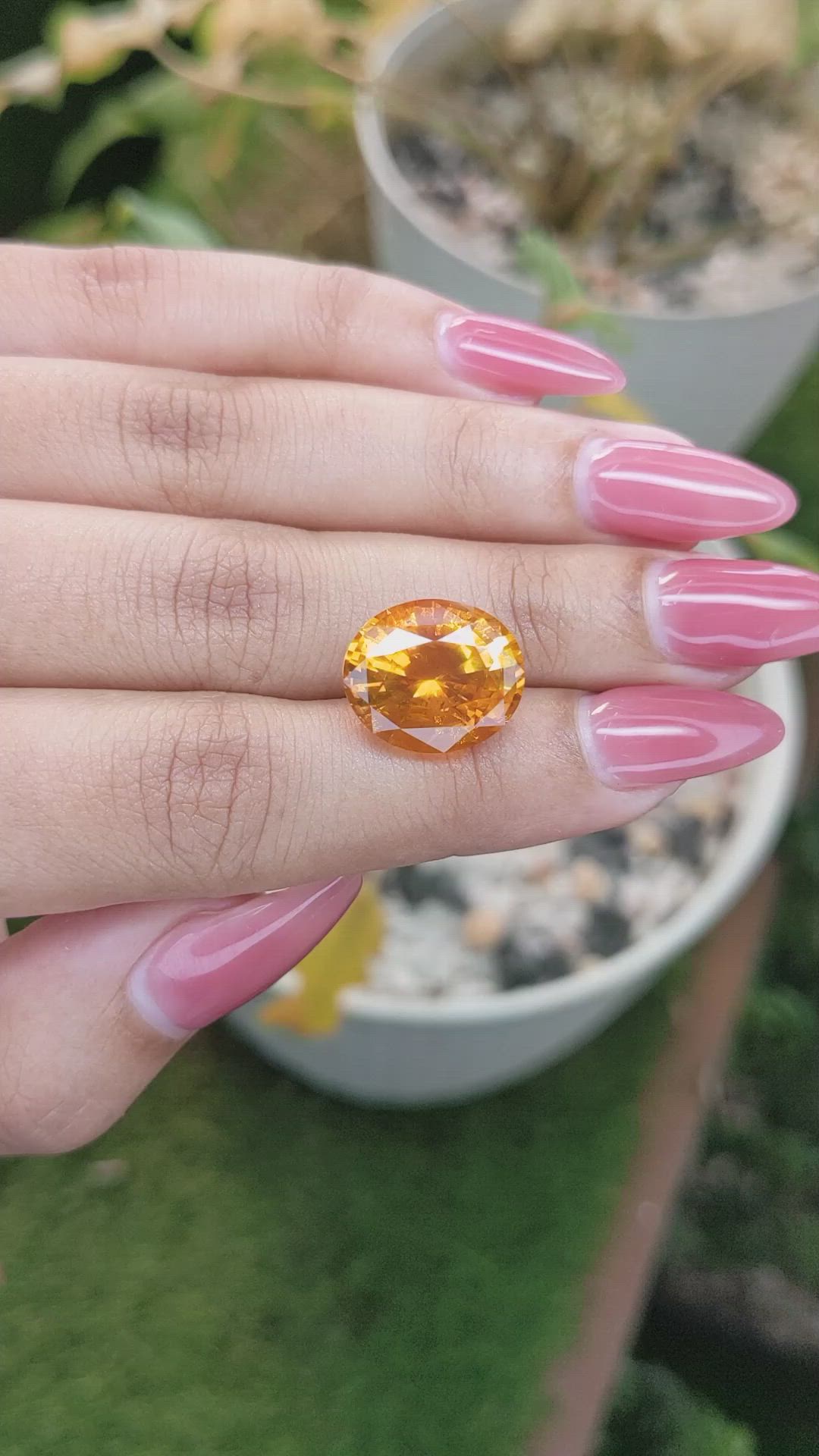12.05 Ct. Orange Sapphire from Ceylon (Sri Lanka) Size Video
