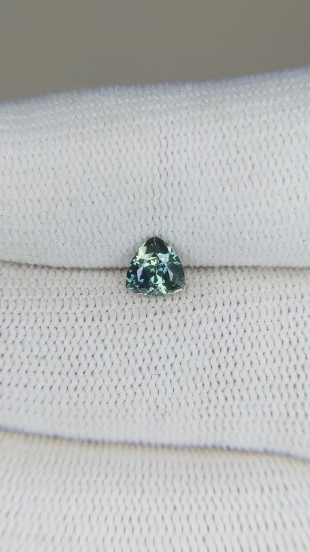0.72 Ct. Bluish Green Sapphire from Montana Size Video