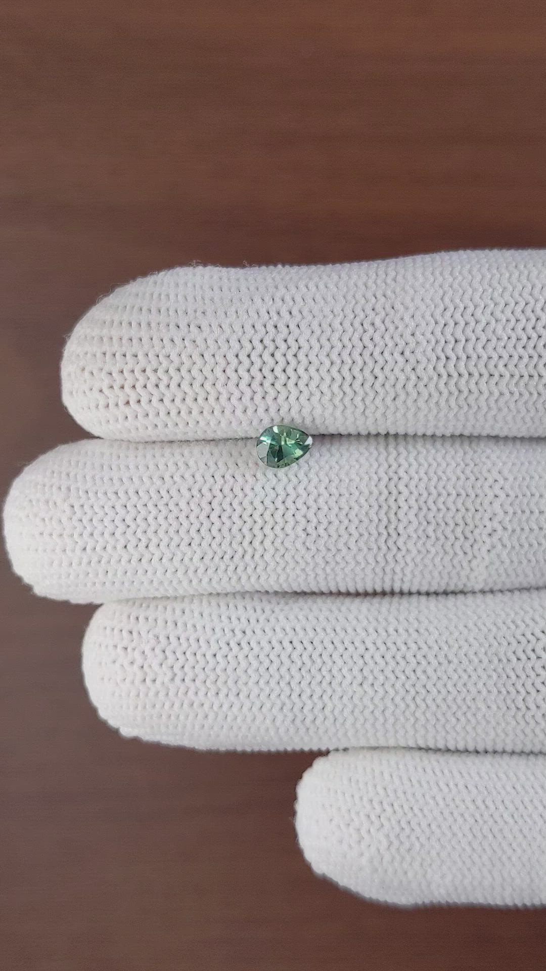 0.65 Ct. Bluish Green Sapphire from Madagascar Size Video