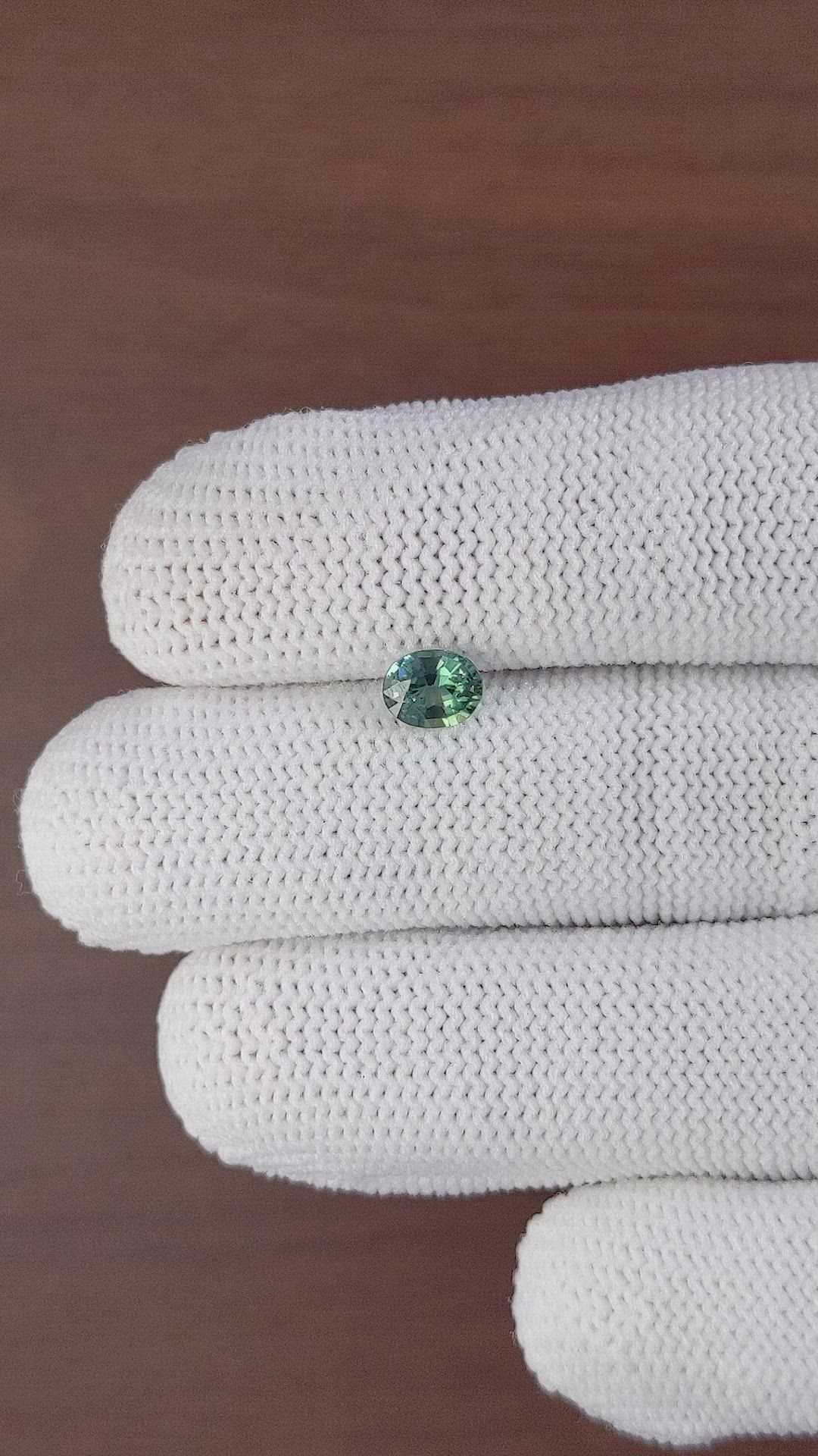 0.84 Ct. Bluish Green Sapphire from Madagascar Size Video