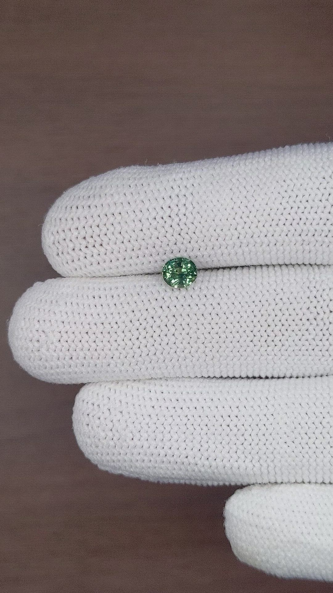 0.85 Ct. Bluish Green Sapphire from Madagascar Size Video