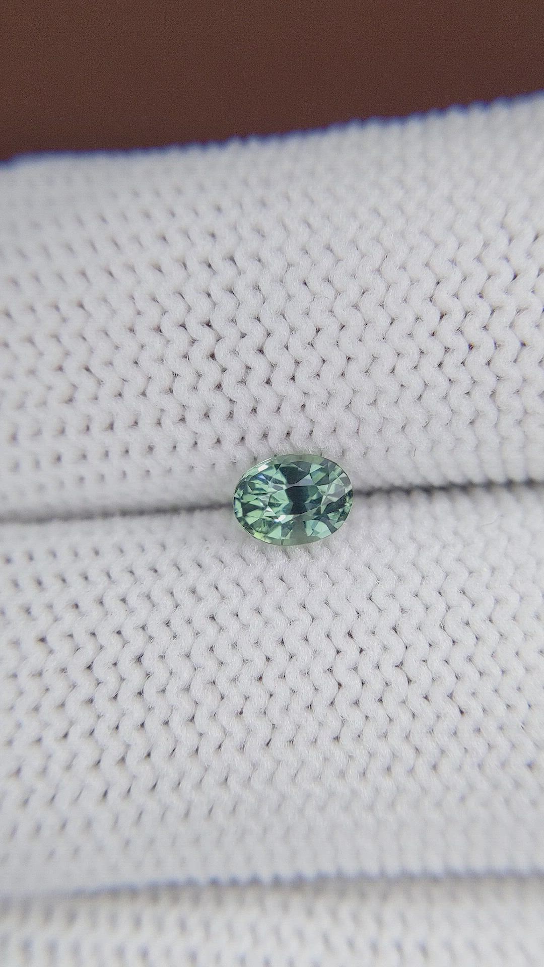 0.61 Ct. Bluish Green Sapphire from Madagascar Size Video