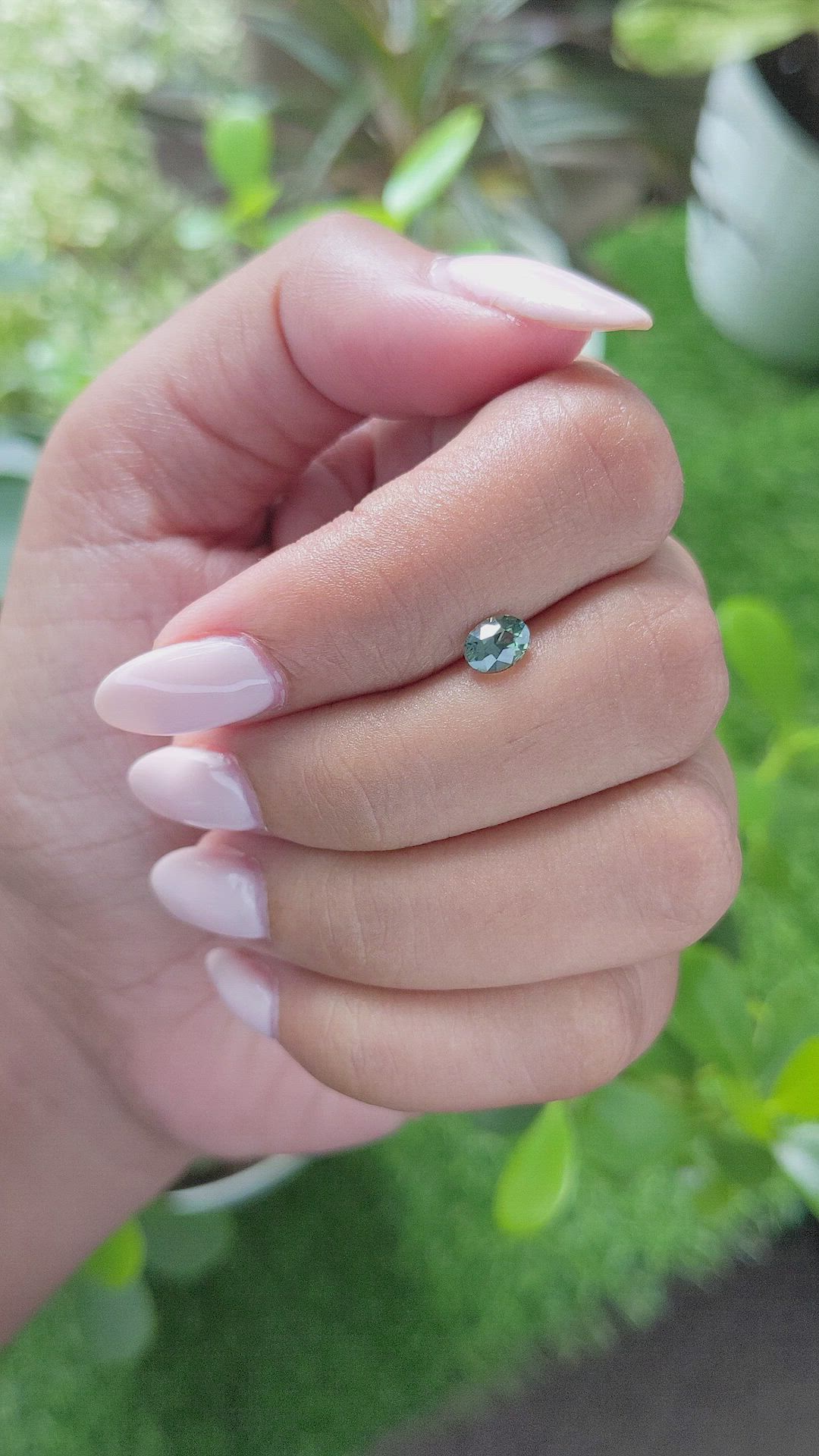 0.61 Ct. Bluish Green Sapphire from Madagascar Size Video