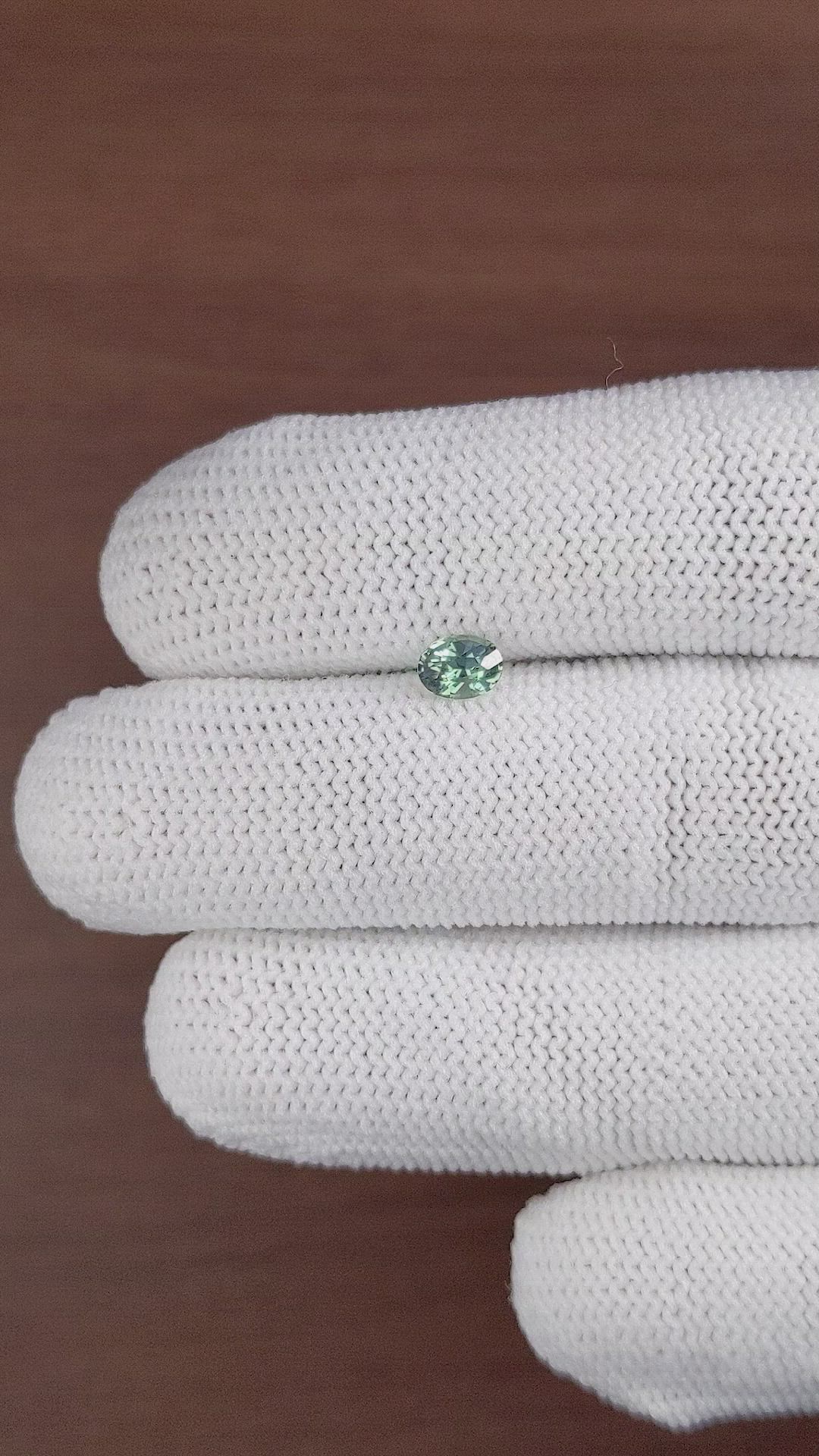 0.61 Ct. Bluish Green Sapphire from Madagascar Size Video