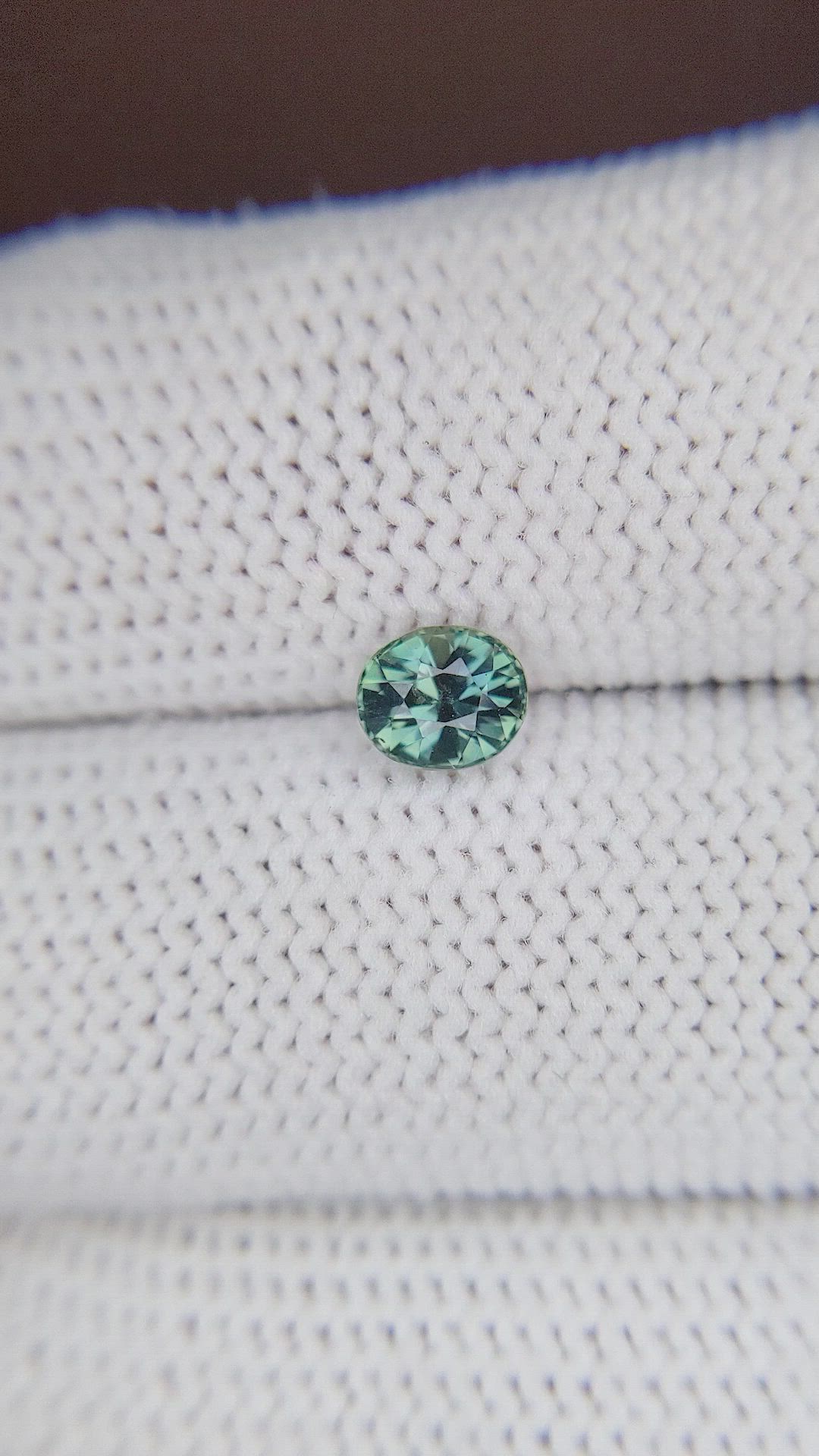 0.83 Ct. Bluish Green Sapphire from Madagascar Size Video