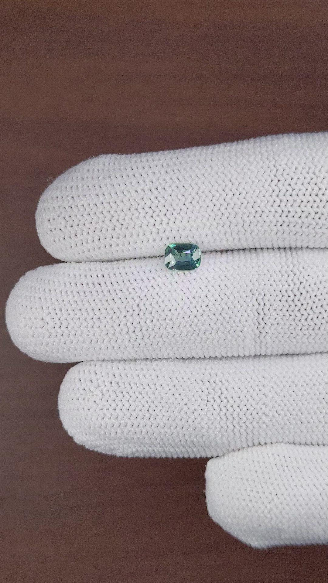 0.85 Ct. Bluish Green Sapphire from Madagascar Size Video
