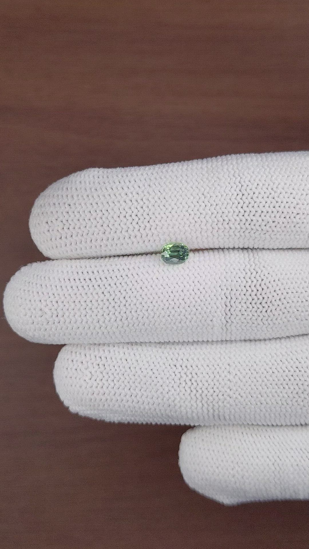 0.79 Ct. Bluish Green Sapphire from Madagascar Size Video