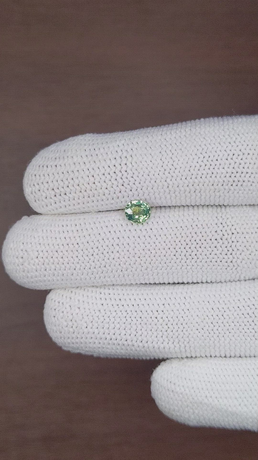 0.83 Ct. Bluish Green Sapphire from Madagascar Size Video