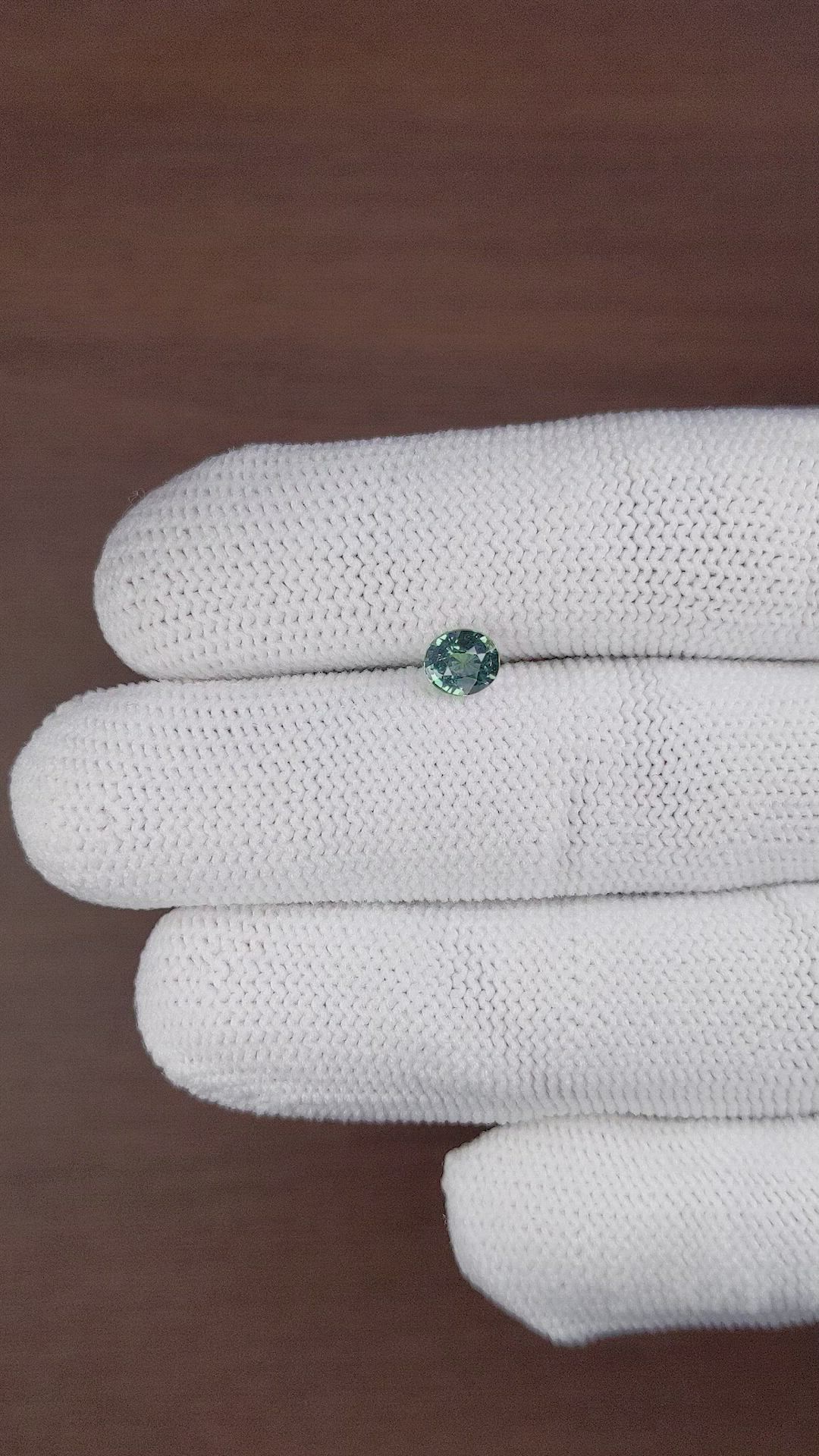 0.95 Ct. Bluish Green Sapphire from Madagascar Size Video