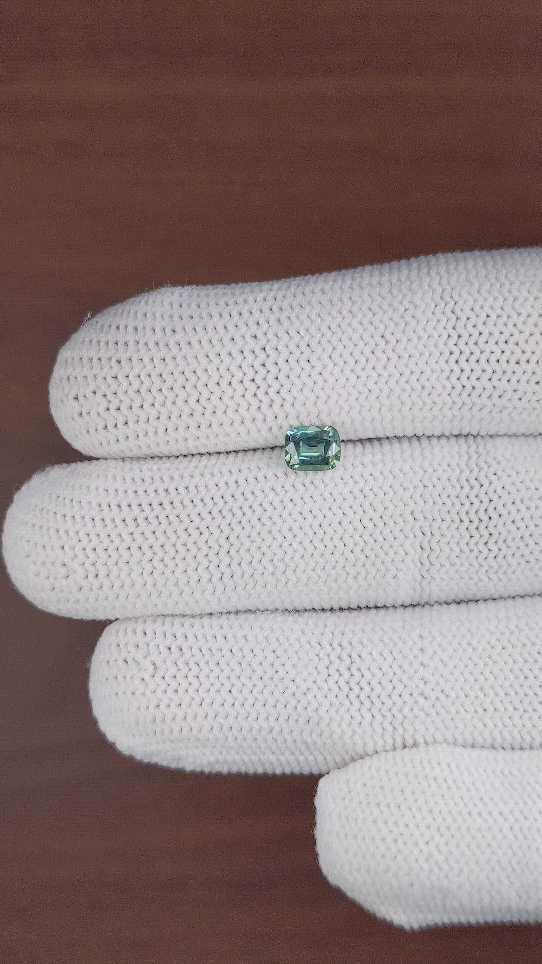 0.76 Ct. Bluish Green Sapphire from Madagascar Size Video