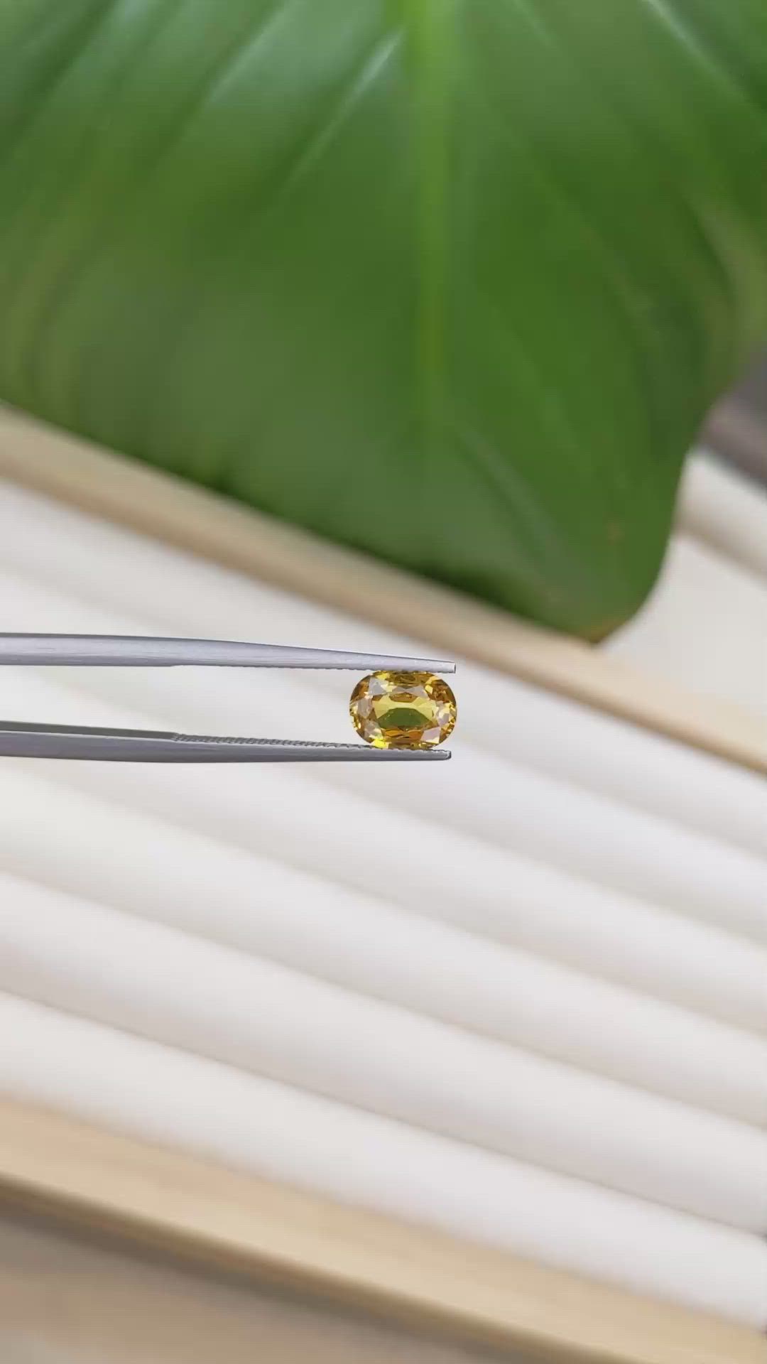 1.57 Ct. Orangish Yellow Sapphire from Ceylon (Sri Lanka) Size Video