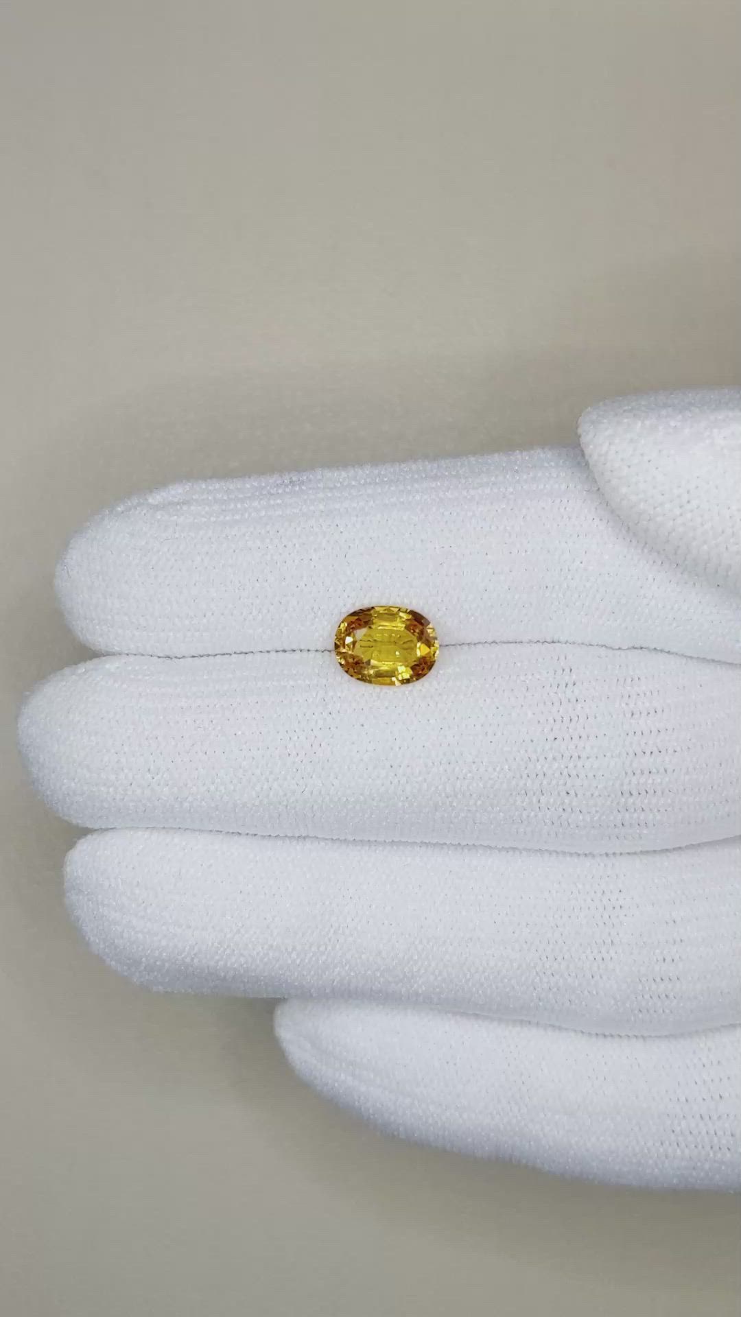 1.57 Ct. Orangish Yellow Sapphire from Ceylon (Sri Lanka) Size Video