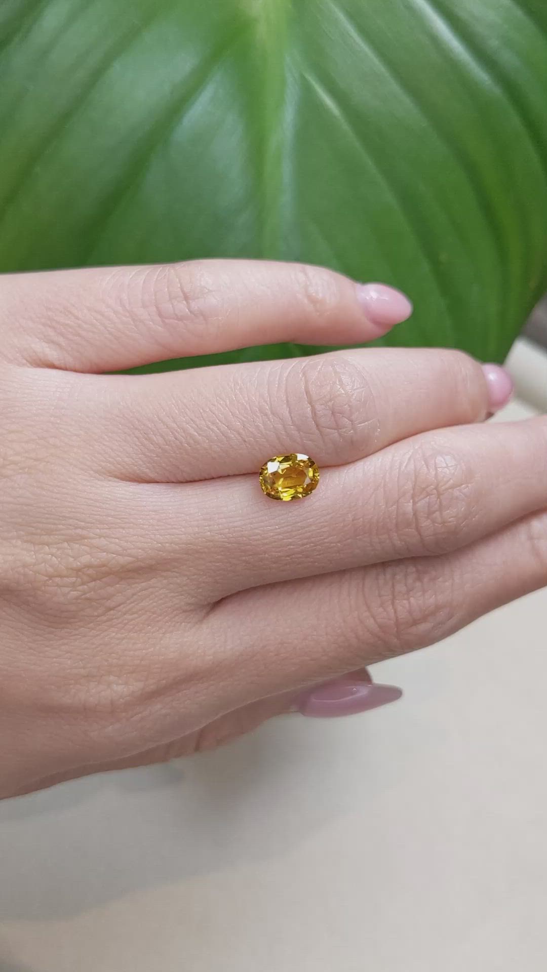 1.57 Ct. Orangish Yellow Sapphire from Ceylon (Sri Lanka) Size Video