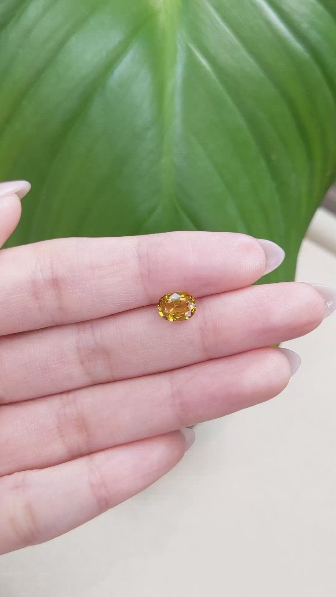1.57 Ct. Orangish Yellow Sapphire from Ceylon (Sri Lanka) Size Video