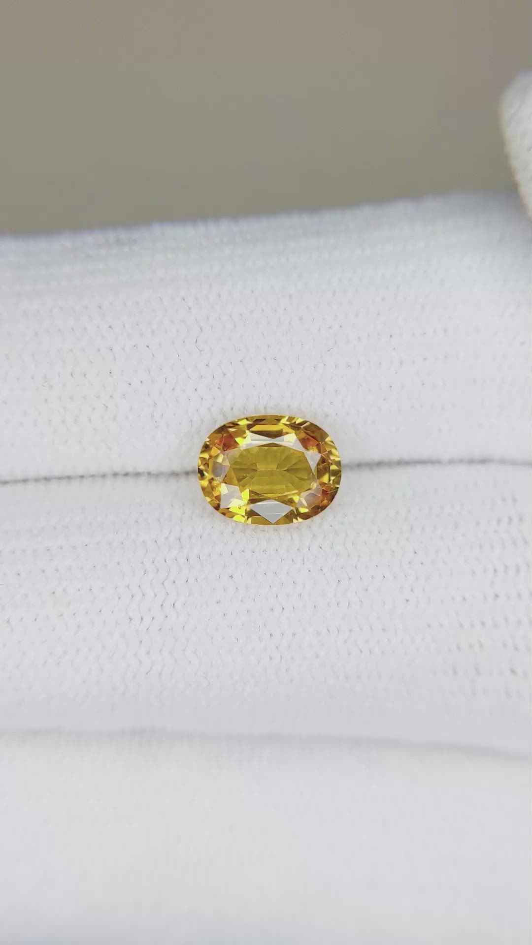 1.57 Ct. Orangish Yellow Sapphire from Ceylon (Sri Lanka) Size Video
