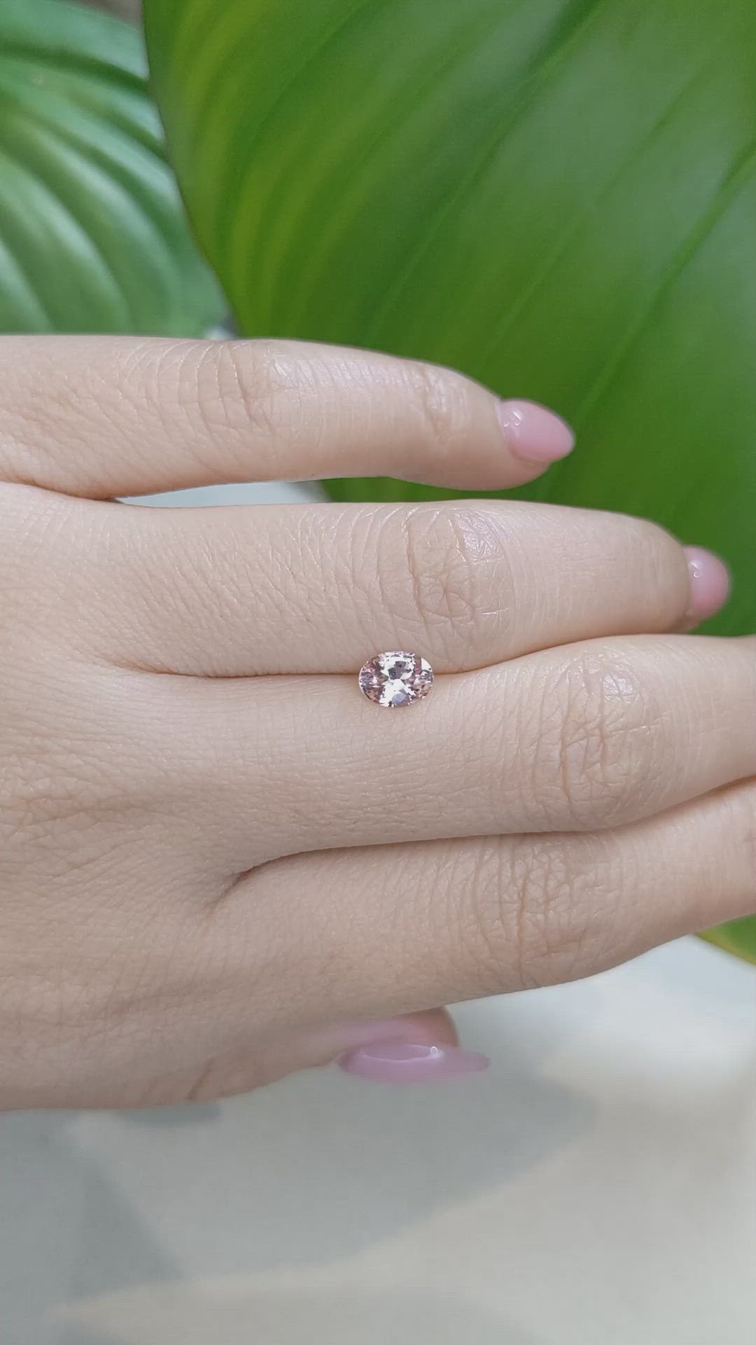 0.74 Ct. Peach Sapphire from Ceylon (Sri Lanka) Size Video