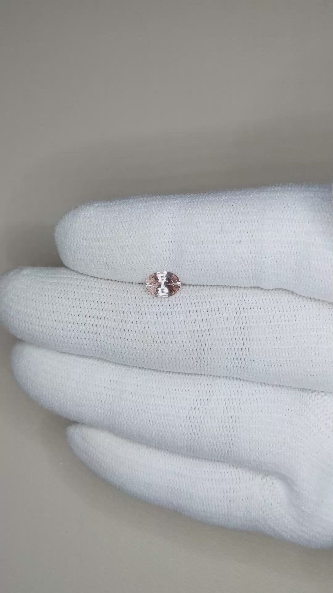 0.74 Ct. Peach Sapphire from Ceylon (Sri Lanka) Size Video