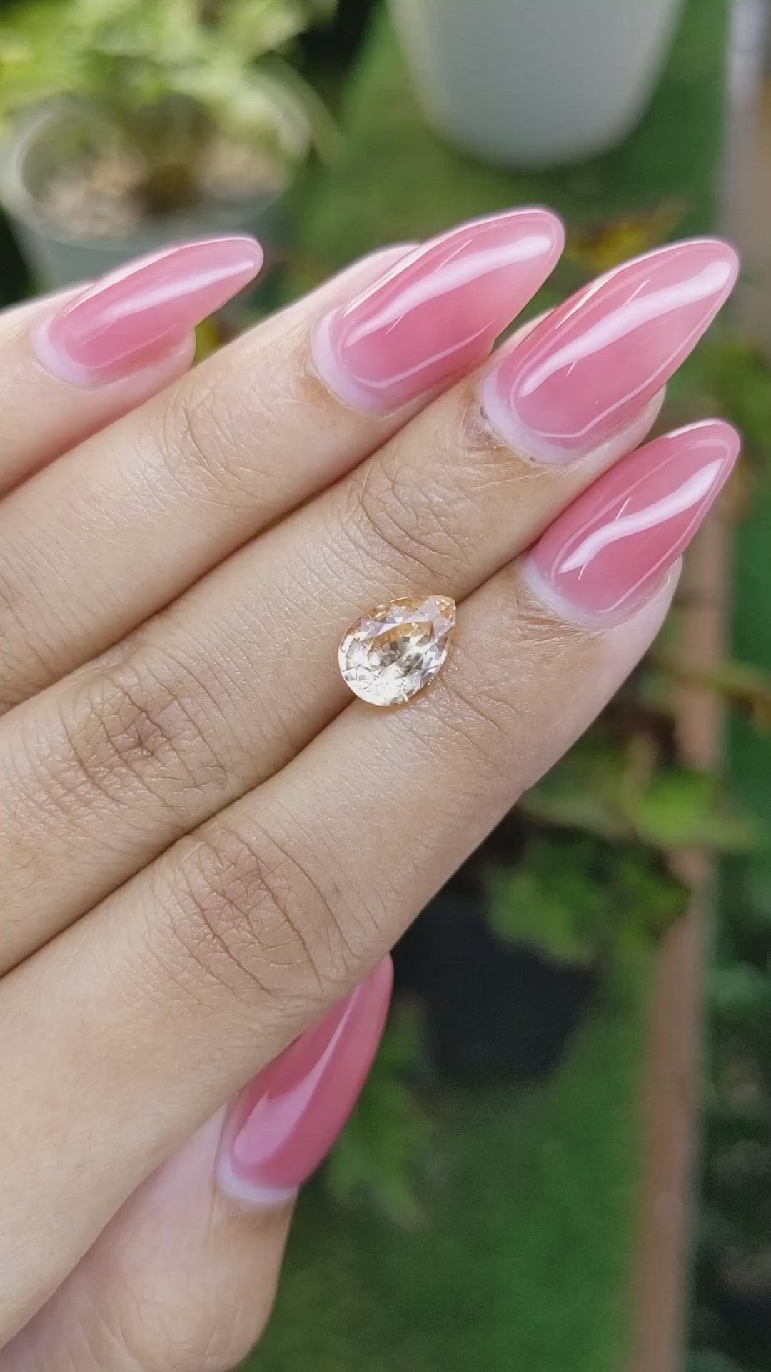 2.32 Ct. Peach Sapphire from Ceylon (Sri Lanka) Size Video