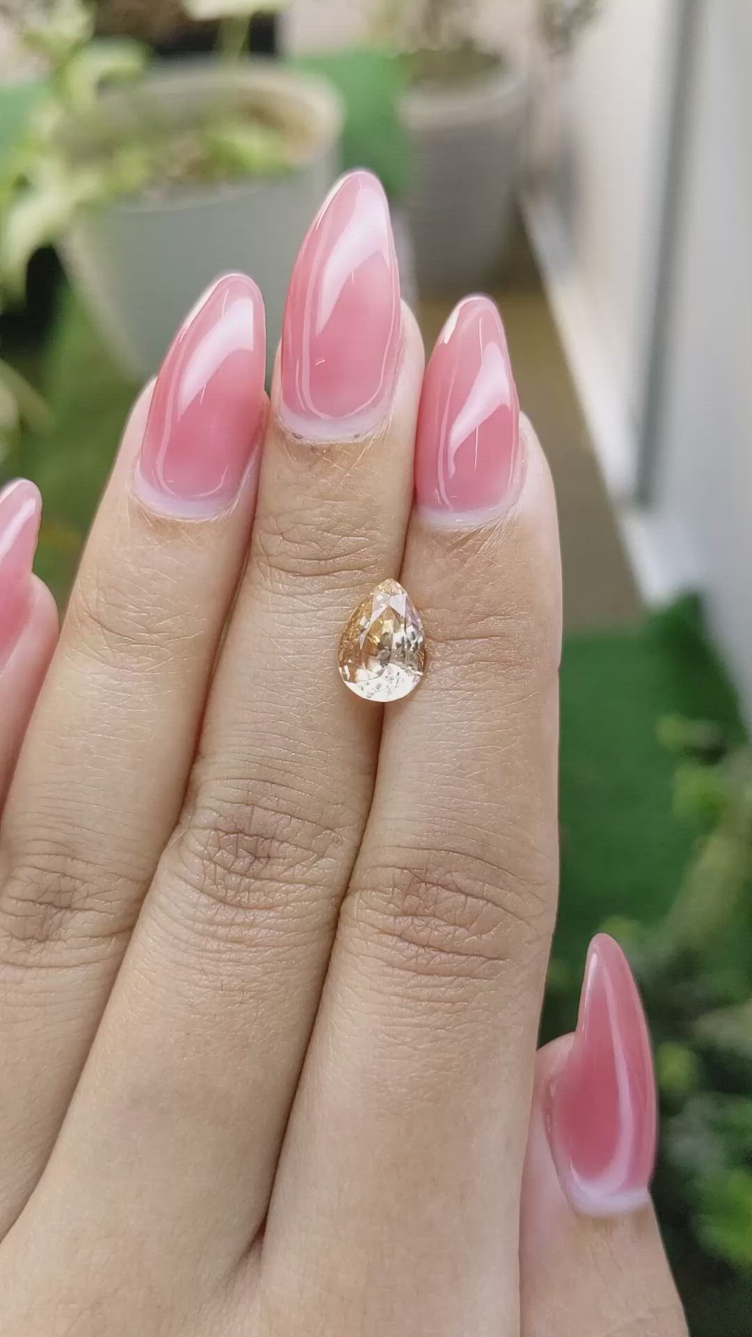 2.32 Ct. Peach Sapphire from Ceylon (Sri Lanka) Size Video