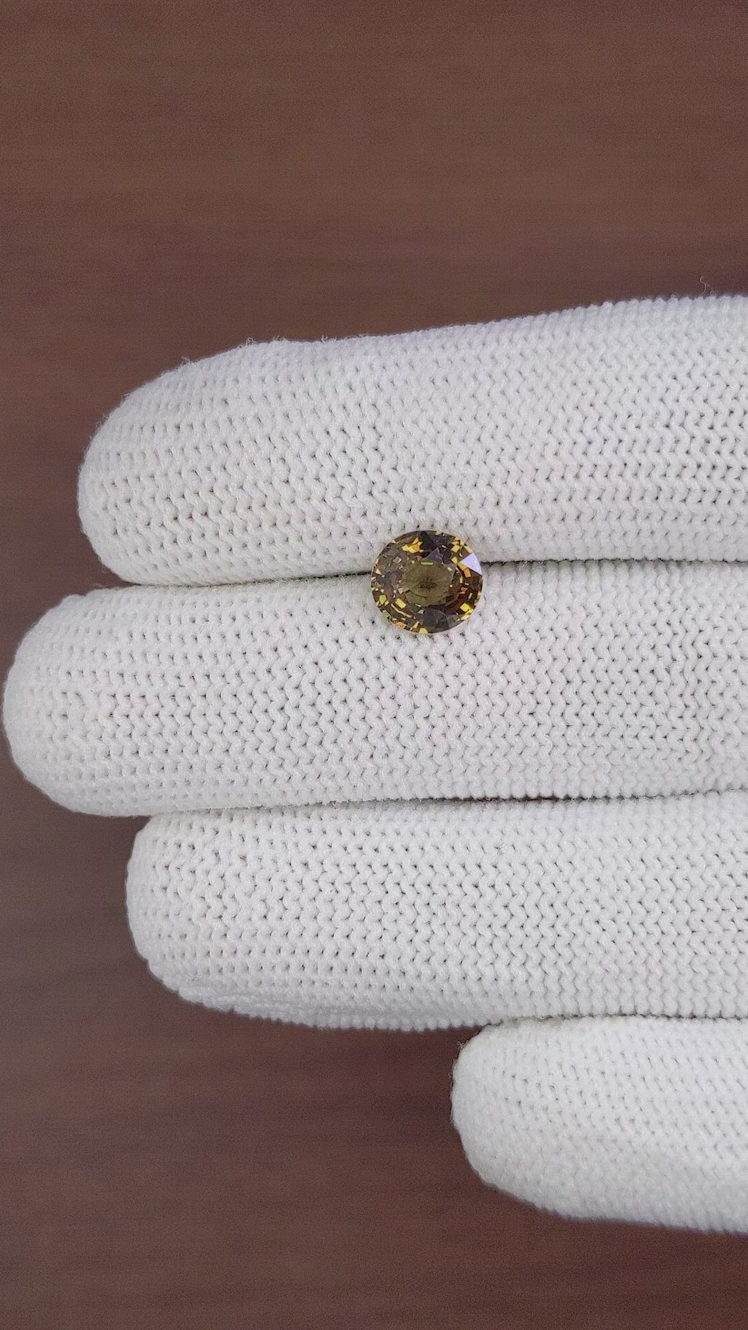 2.11 Ct. Greenish Brown Sapphire from Madagascar Size Video